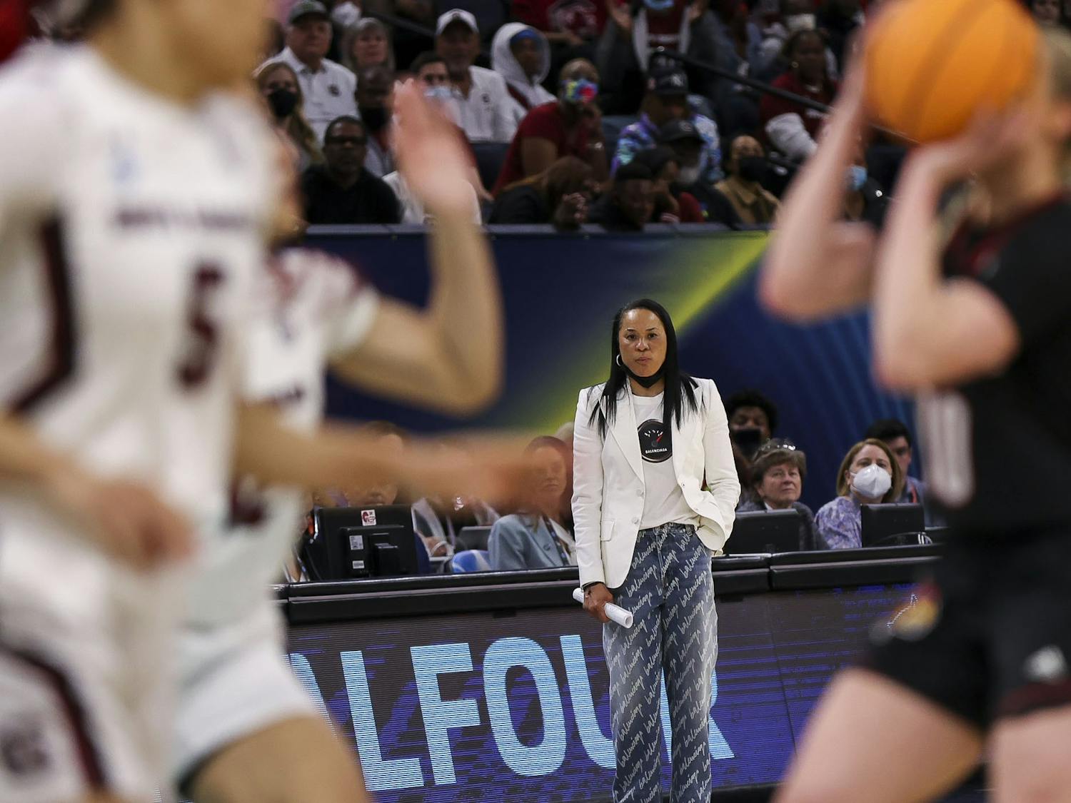 Head Coach Dawn Staley watches the Gamecocks defense during the fourth quarter of South Carolina's 72-59 victory over Louisville on April 1, 2022, advancing to the National Championship game.
