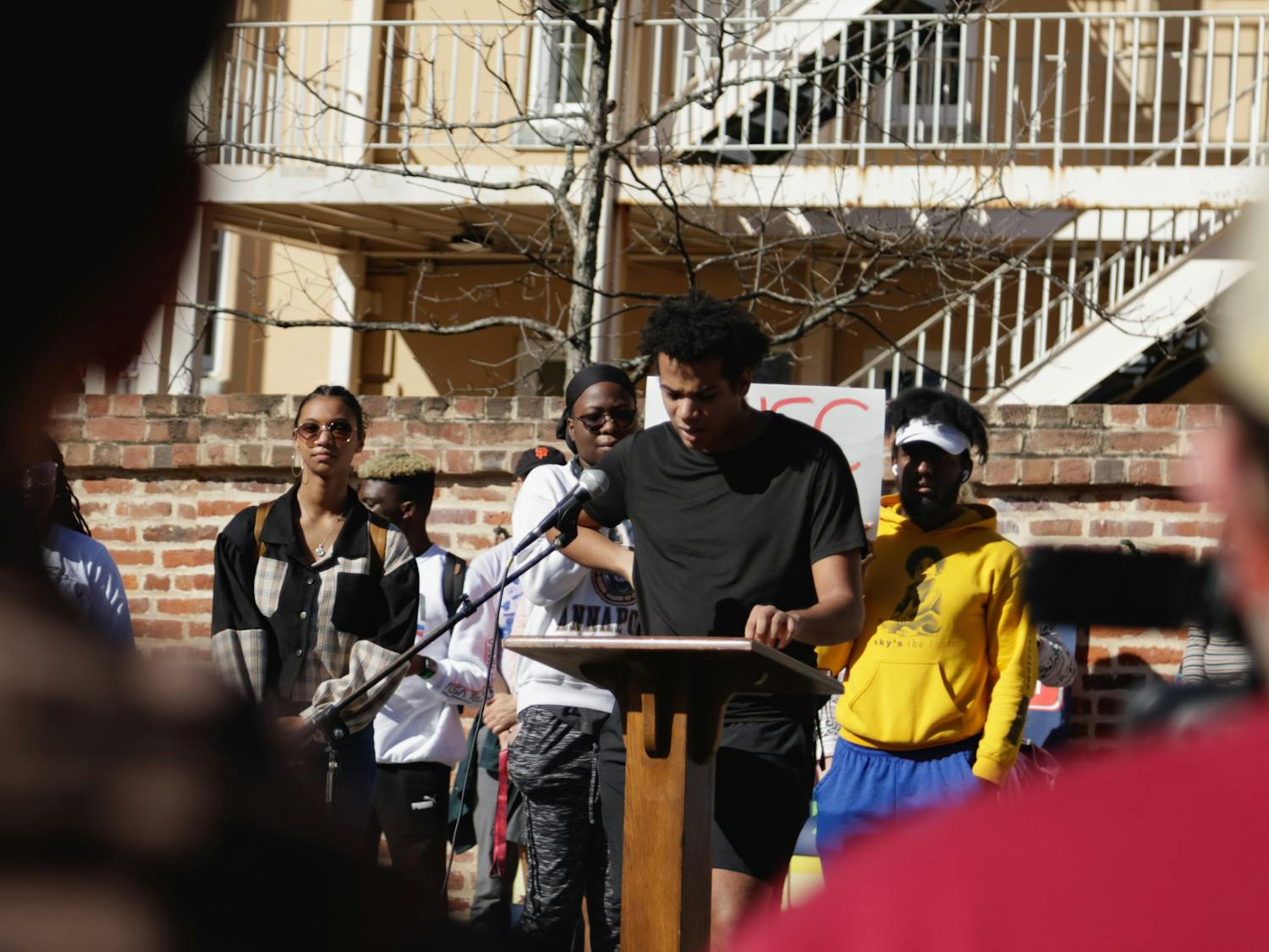 A protester speaks before the crowd gathered on Greene Street on Jan. 20, 2023. The protest was organized by Courtney McClain, a fourth-year broadcast journalism student and the president of the SC NAACP Y&amp;C Division.
