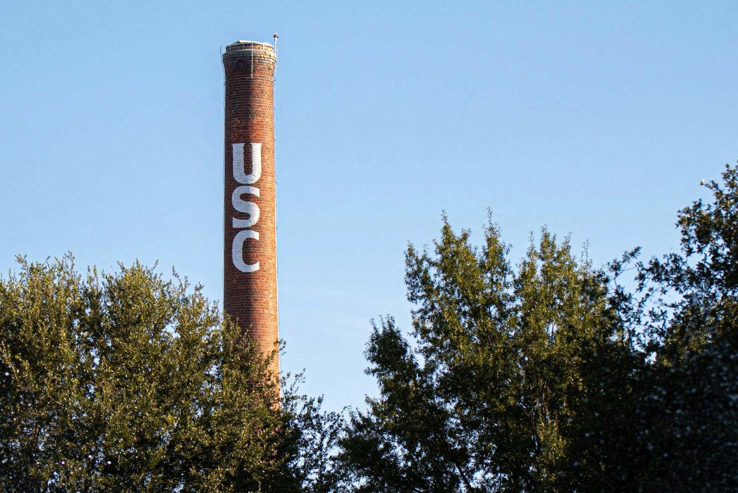 FILE— The 鶹С򽴫ý smokestack stands above the University of South Carolina's Columbia campus.