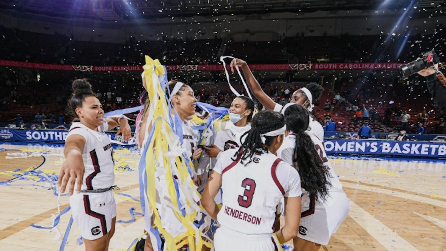Members of the South Carolina women's basketball team celebrate after defeating Georgia 67-62 in the SEC Championship. This is the team's sixth SEC championship win in seven years.