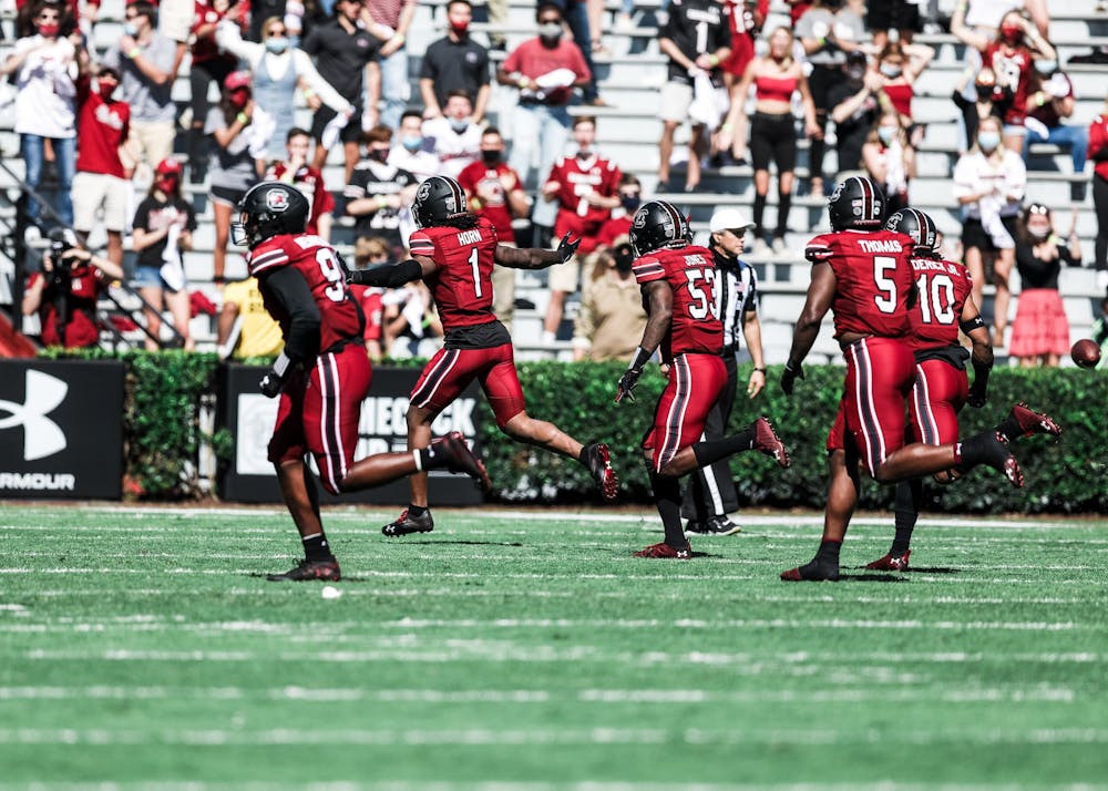 Gamecock defensive players celebrate during the game against the Auburn Tigers. The Gamecocks won 30-22 at home against the Tigers on Saturday, Oct. 17.