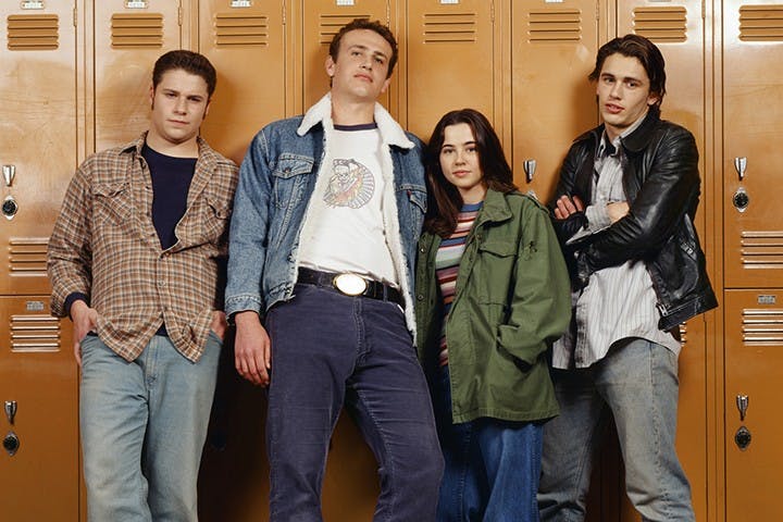 FREAKS AND GEEKS -- Season 1 Gallery -- Pictured: (l-r) Seth Rogen as Ken Miller, Jason Segel as Nick Andopolis, Linda Cardellini as Lindsay Weir, and James Franco as Daniel Desario -- (Photo by: Chris Haston/NBC/NBCU Photo Bank)