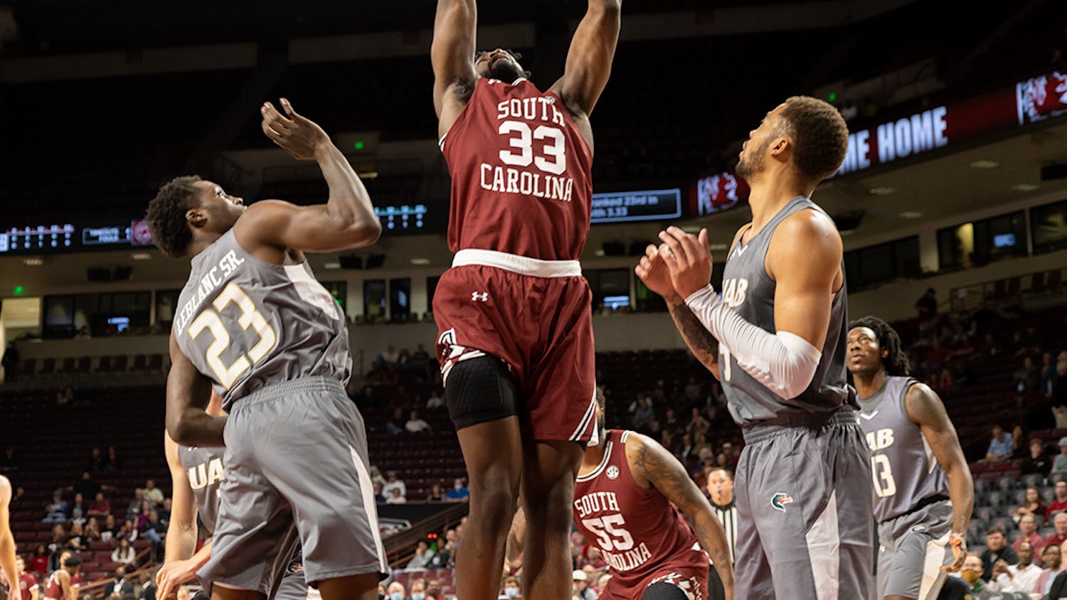 Sophomore forward Josh Gray goes up to dunk the ball, scoring points for the Gamecocks. During this game against UAB on Nov. 18, 2021, the Gamecocks won by a score of 66-63.