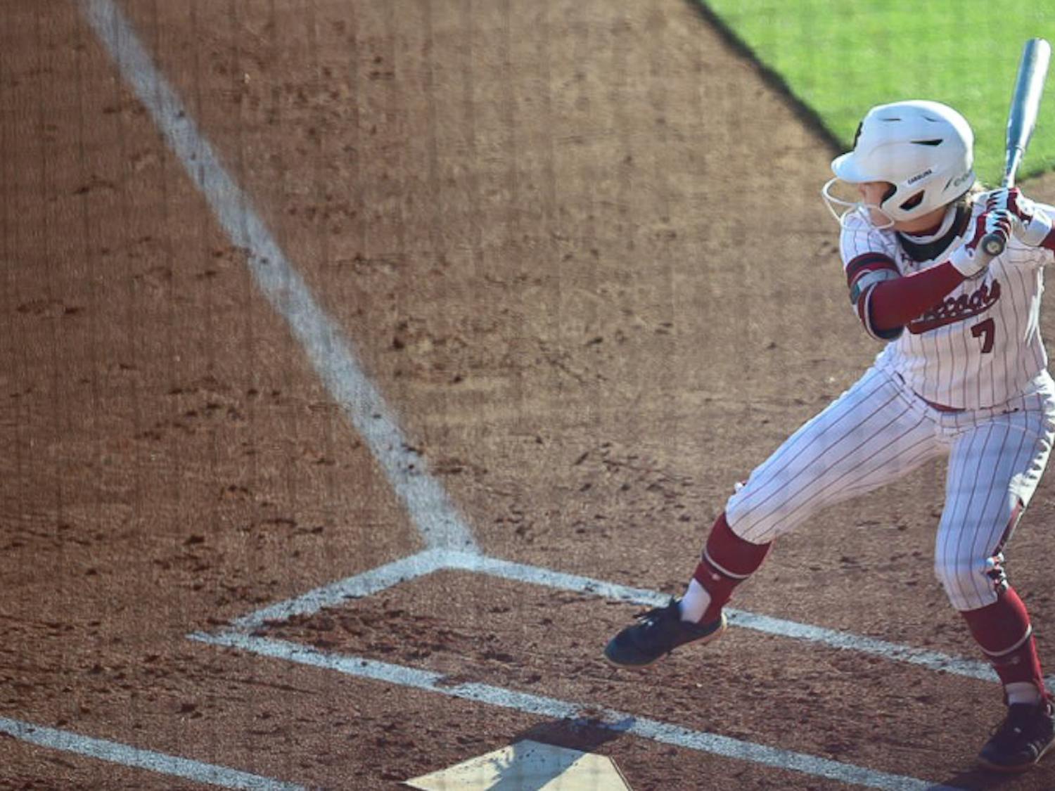 FILE — Softball player Mackenzie Boesel, who has since graduated, gets in batter's position at home plate on April 4, 2021. The softball team readies itself for the upcoming season.&nbsp;