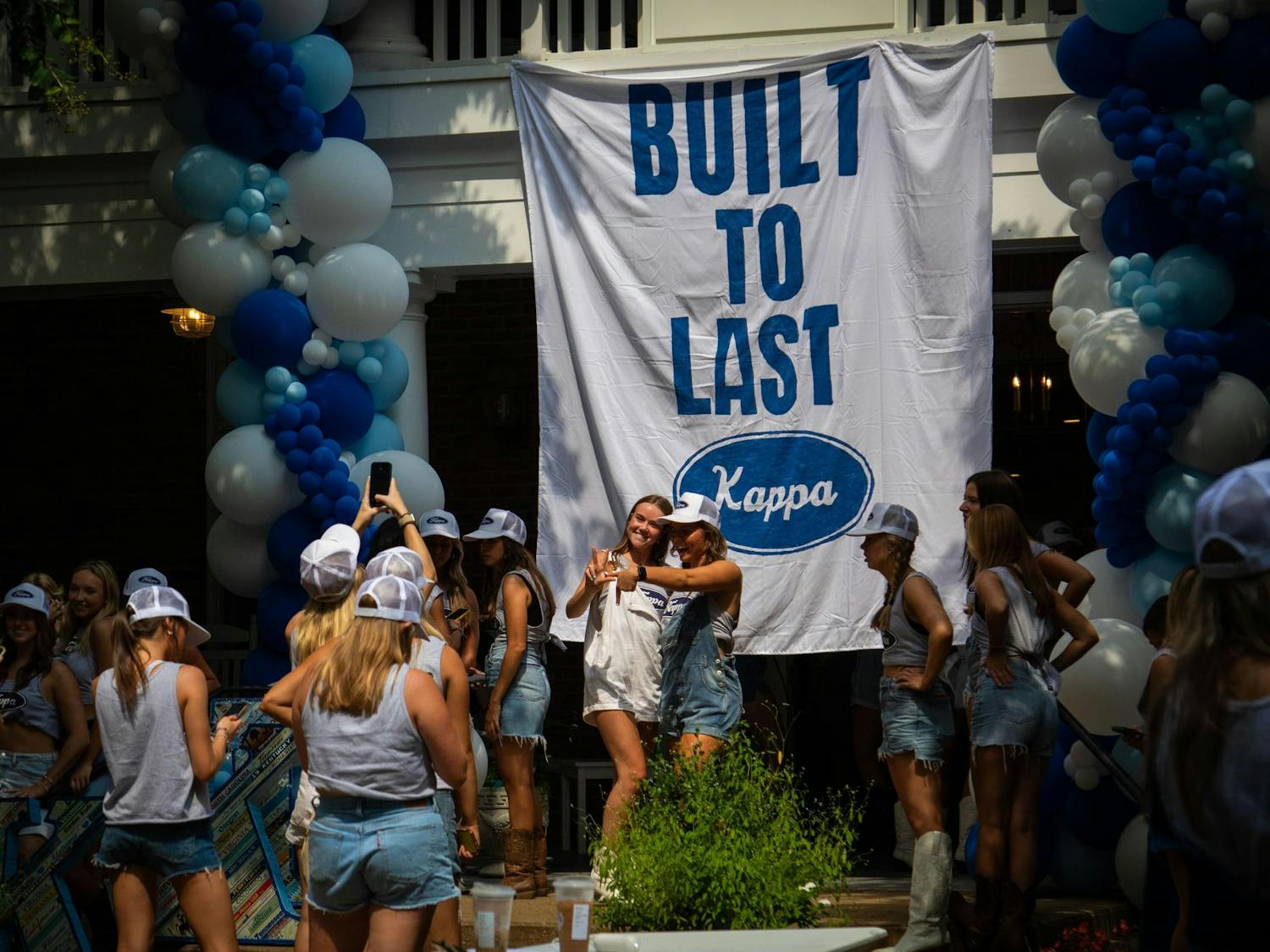 Members of Kappa Kappa Gamma celebrate their newest pledge class at their house in Greek Village on Bid Day. Bid Day marks the end of four rounds of recruitment.