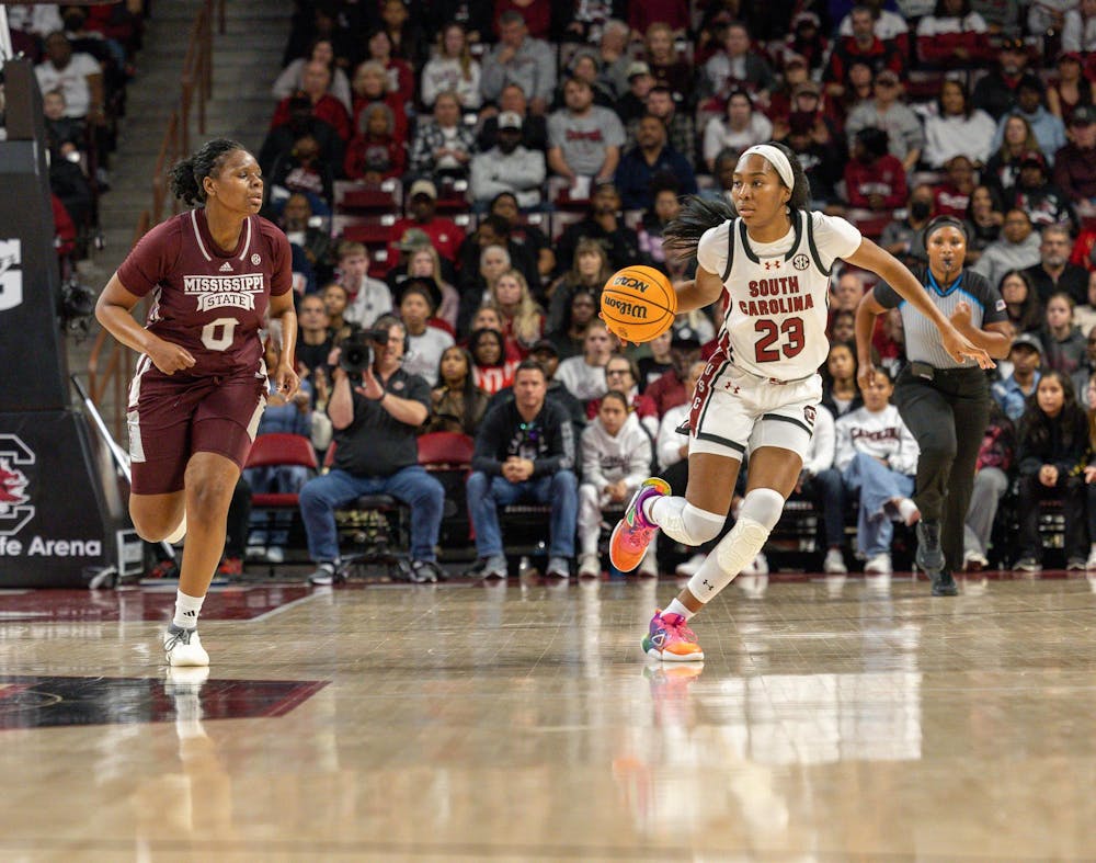 <p>Junior guard Bree Hall drives the ball through the court against Mississippi State's defense. The Gamecocks won 85-66 against the Bulldogs.</p>