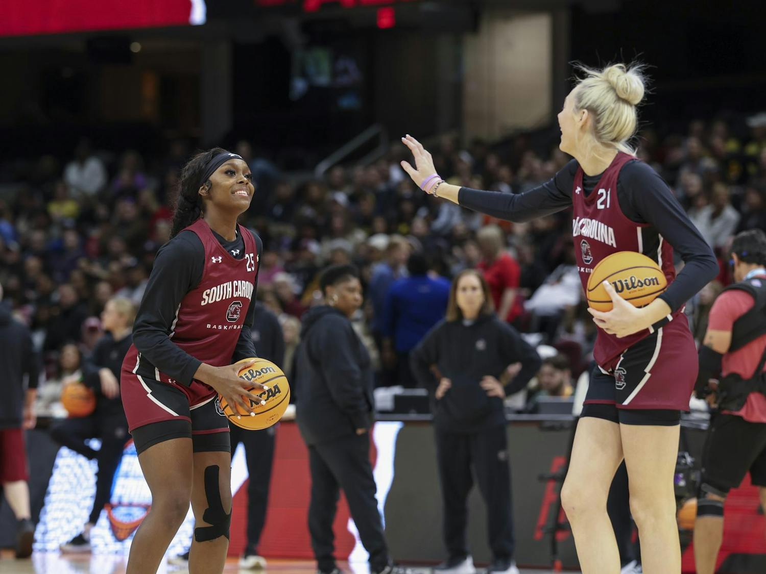Sophomore guard Raven Johnson (left) prepares to shoot while sophomore forward Chloe Kitts (right) jokingly defends her during Super Saturday Practice. The Gamecocks were joking around with one another and dancing throughout the open practice on April 6, 2024.