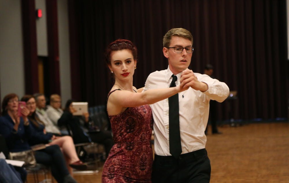 Sarah Stevens, fourth-year graphic design major, and Andrew Lopiano, fourth-year political science and English major, compete in the 13th annual Gamecock Invitational Ballroom Competition.