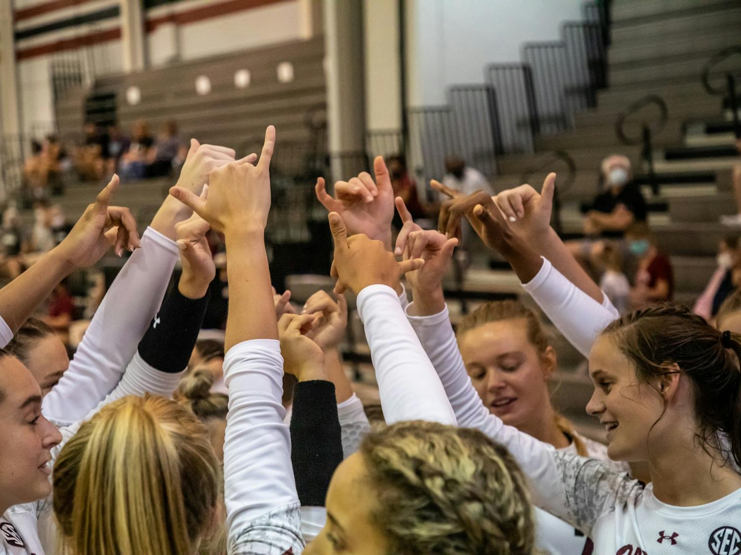 FILE— The volleyball team huddles together following their match against UCF on Sept. 3, 2021. South Carolina defeated UCF 3-1