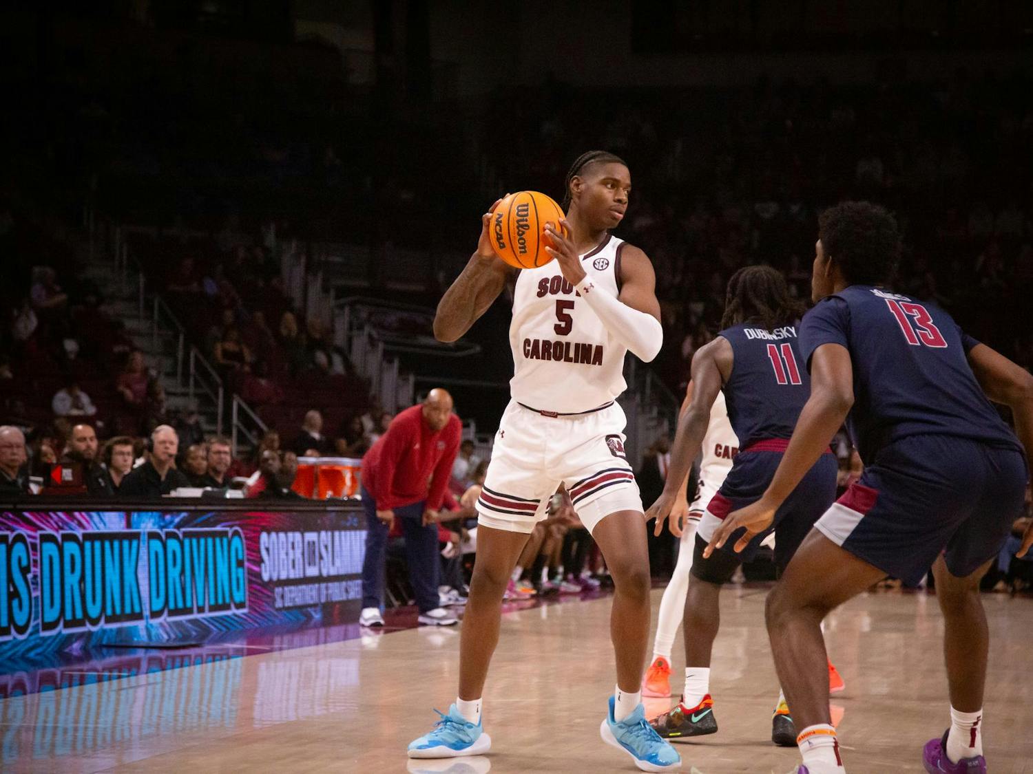 Graduate student forward Nick Pringle looks to pass the ball on Nov. 8, 2024 at Colonial Life Arena, where the University of South Carolina faces South Carolina State University. Pringle ended the night with 8 points and 4 rebounds for the Gamecocks.
