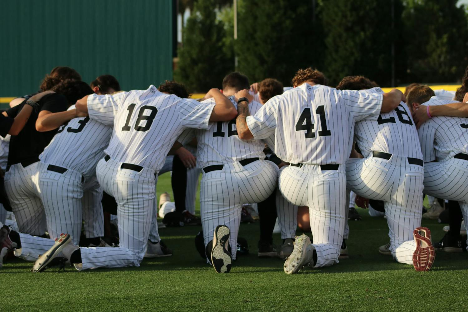FILE — The University of South Carolina baseball team circles up prior to its game against the University of Florida on April 21, 2023. The Gamecocks defeated the Gators 5-2 and ended its 鶹С򽴫ý with a record of 42-21.