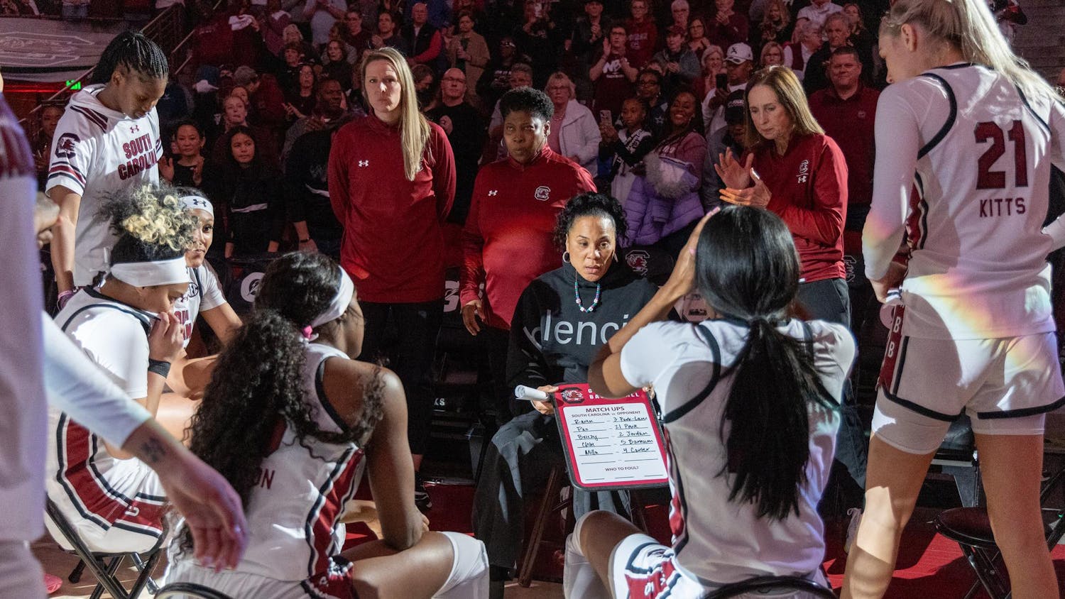FILE — The Gamecock women's basketball team huddles around head coach Dawn Staley during a timeout on Jan. 7, 2024. The team secured on Sunday afternoon its eighth tournament championship in the past decade.