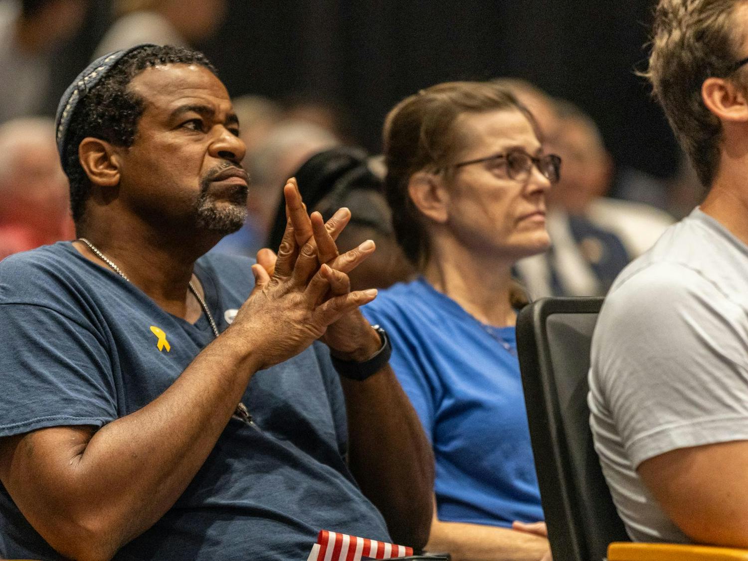 Newbury resident Giacomo Knox listens to speakers during the Israel Solidarity Rally hosted by Gamecocks for Israel on Oct. 7, 2024. Knox attended with other members of his Synagogue.