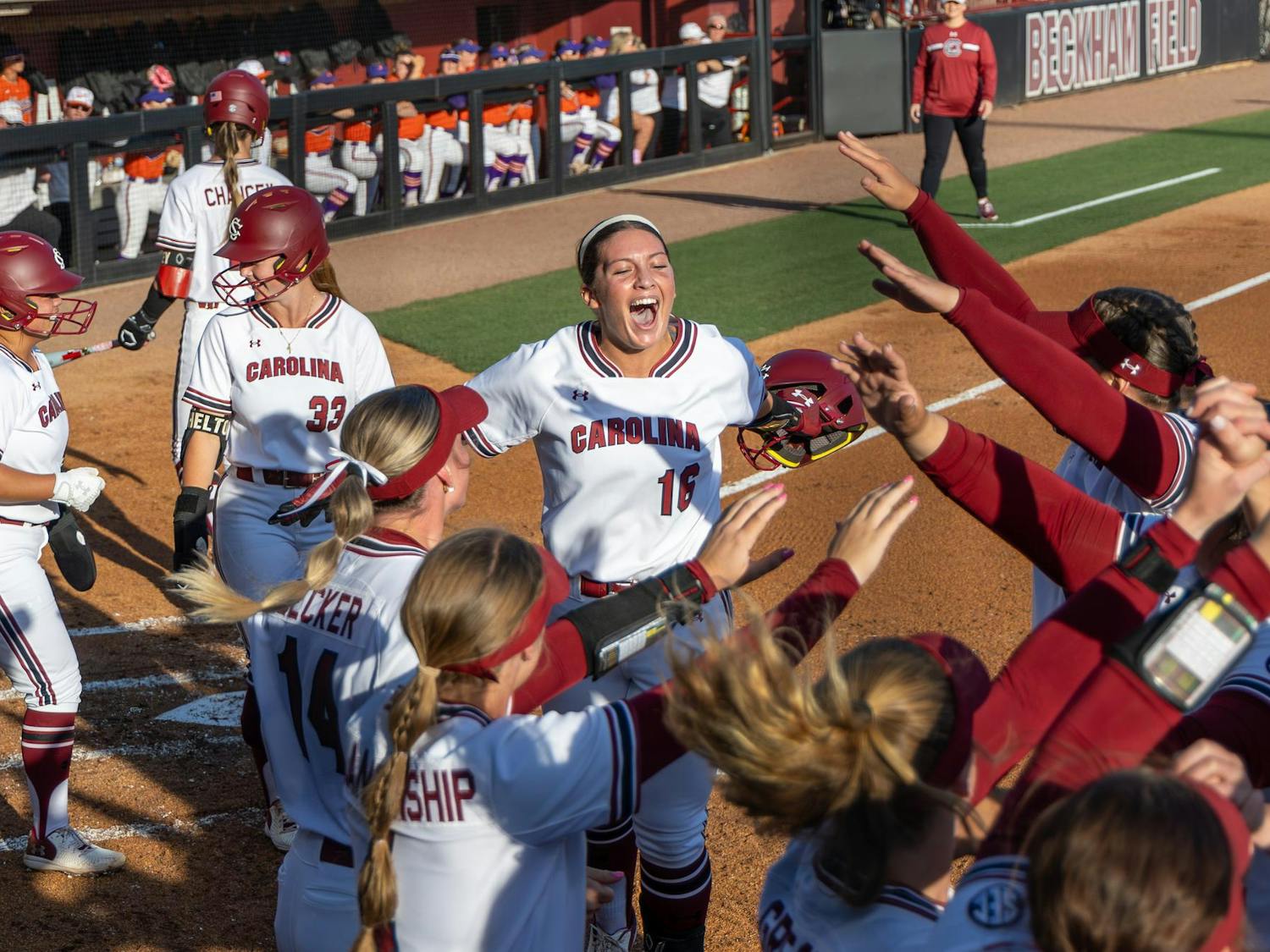 FILE — Junior infielder Arianna Rodi (center) celebrates with her teammates after scoring a run for South Carolina against Clemson on March 25, 2025 at Carolina Softball Stadium. The Gamecocks are 35-11 (10-8 SEC) on the season after sweeping the Kentucky Wildcats at home.