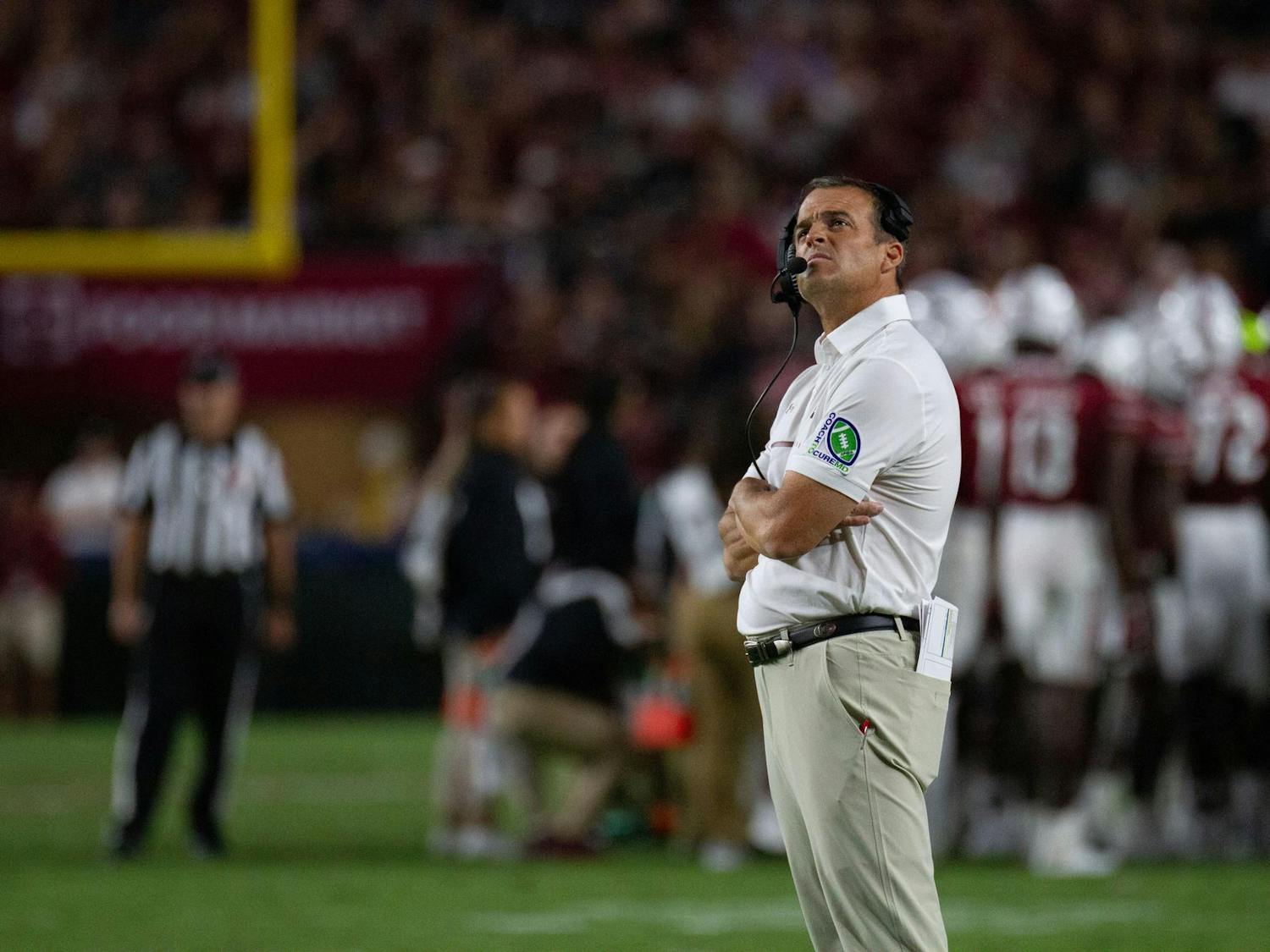 FILE - Head coach Shane Beamer looks at a replay on the jumbotron during South Carolina's game against Charlotte on Sept. 24, 2022, at Williams-Brice Stadium. The Gamecocks beat the 49ers 56-20.