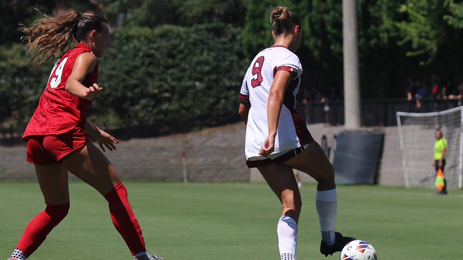 FILE — Junior forward Reagan Schubach dribbles the ball next to a Miami University forward during a match on Aug. 24, 2025, at Stone Stadium. The Gamecocks traveled to Clemson to take on the Tigers on Aug. 28, 2025, ending in a score of 0-0.