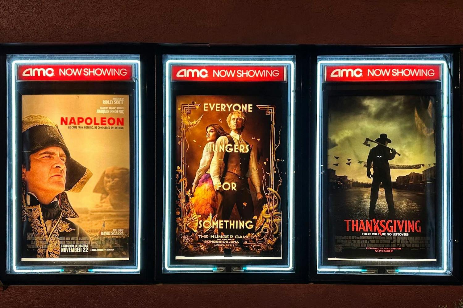 A current attractions poster of AMC Harbison 14 displays "Napoleon," "The Hunger Games: The Ballad of Songbirds &amp; Snakes" and "Thanksgiving," on Nov. 29, 2023. The newest "Hunger Games installment hit theaters Nov. 17.
