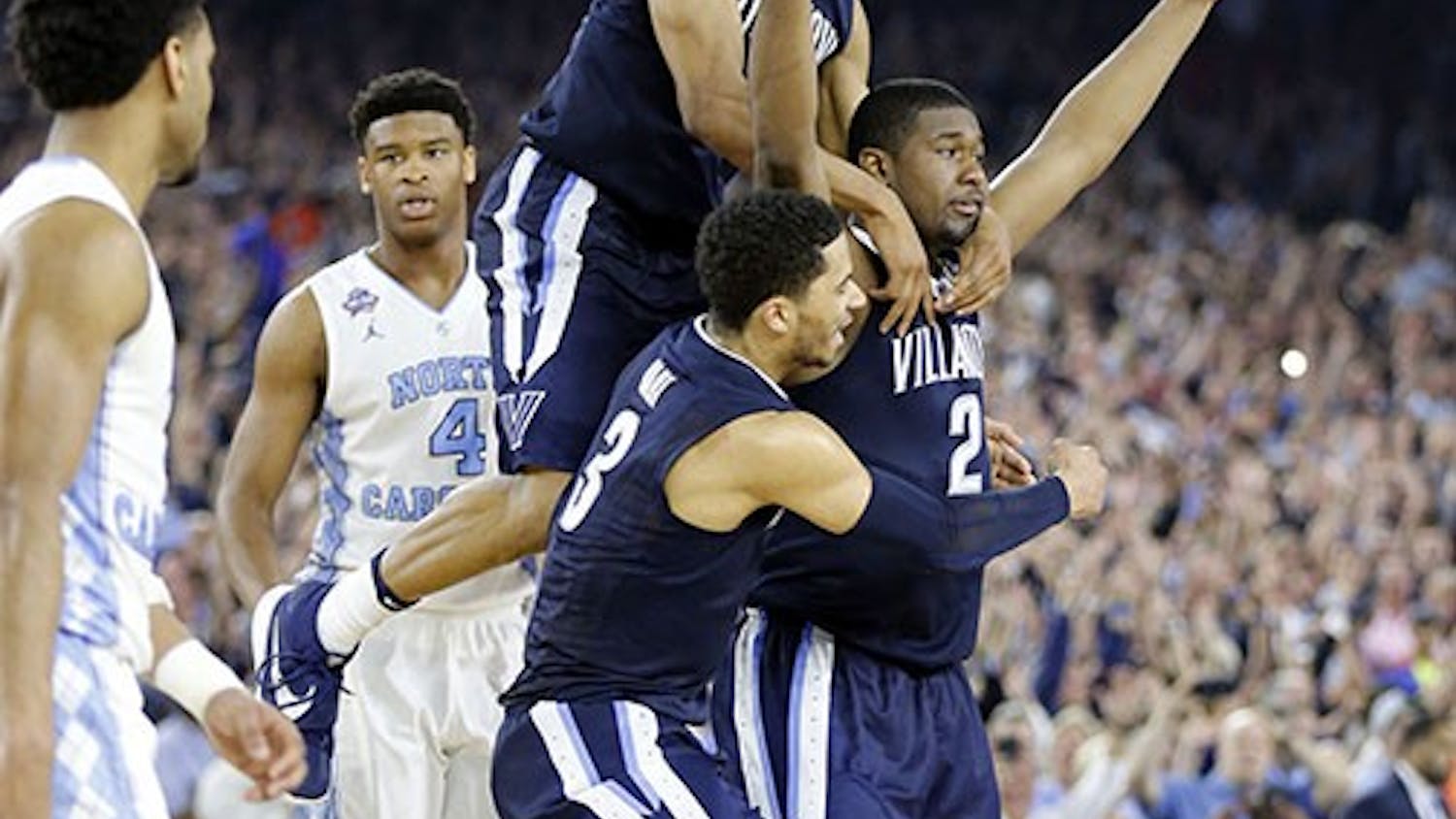 Villanova's Kris Jenkins celebrates his game-winning three-point basket over North Carolina on Monday, April 4, 2016, at NRG Stadium in Houston. (Yong Kim/Philadelphia Inquirer/TNS)