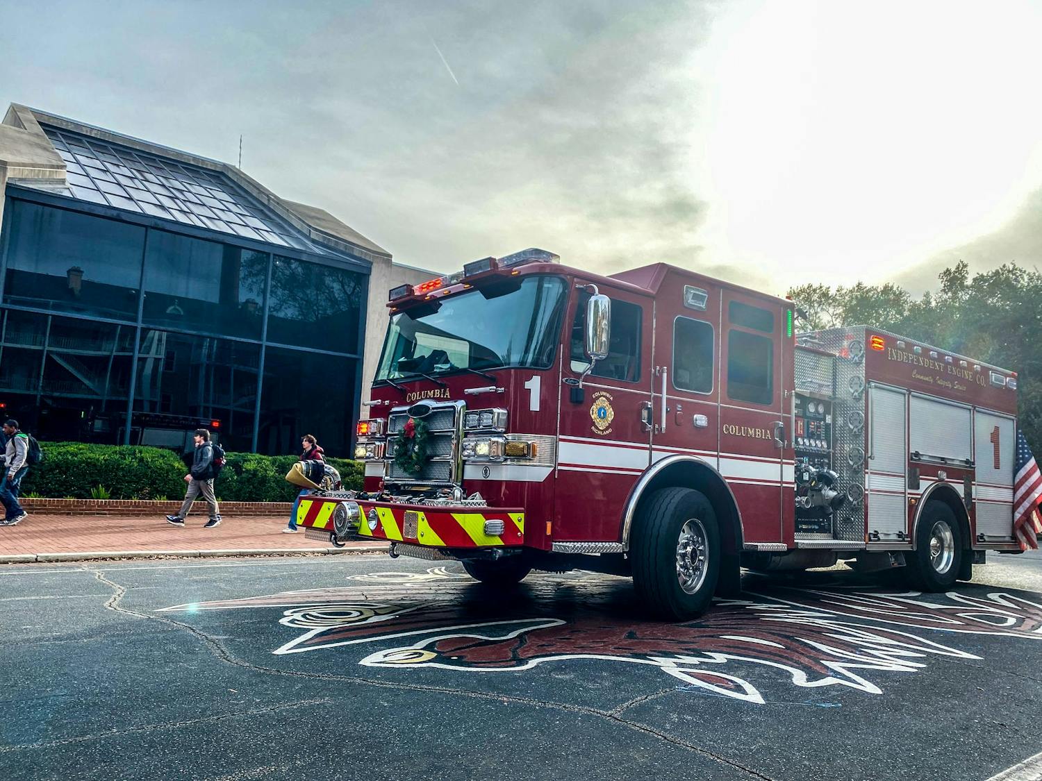 A Columbia Fire Department engine sits on Greene Street in front of Russell House on the University of South Carolina campus on Nov. 30, 2023. The department responded to a fire alarm in the building just before 3 p.m.