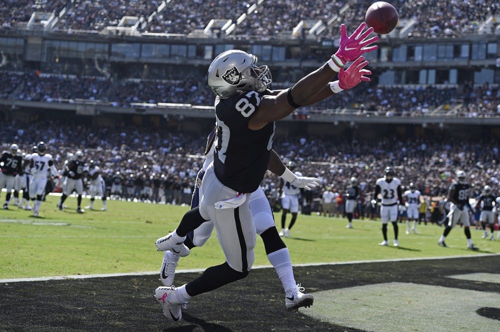 The Oakland Raiders&apos; Jared Cook is unable to make the catch in the end zone against the Baltimore Ravens in the first half at the Coliseum in Oakland, Calif., on Sunday, Oct. 8, 2017. (Jose Carlos Fajardo/Bay Area News Group/TNS)