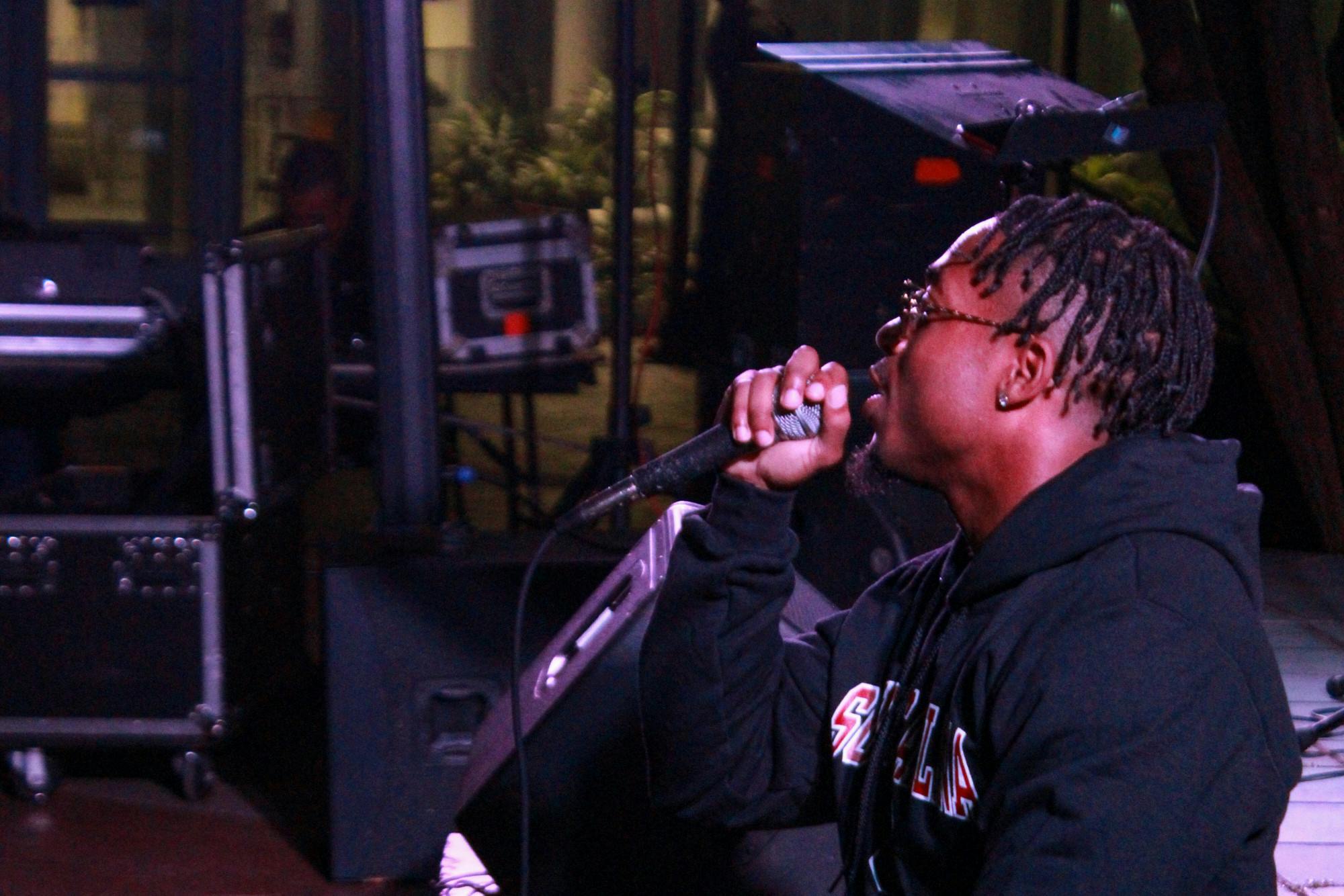 Closeup of fourth-year sports and entertainment management student Joshua Jordan, known as The Gamecock Rapper performing to a crowd of music lovers during the Battle of the Bands event held on Oct. 5, 2022. The competition brought acappella, folk, rap and rock to the Russel House Patio in a variety of performances.