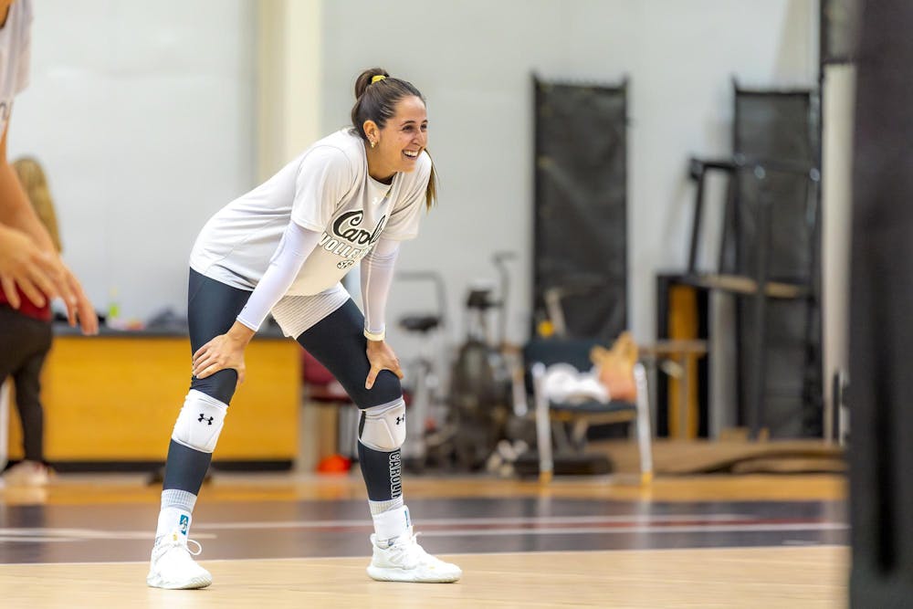 <p>Junior outside hitter Jolie Cranford laughs while preparing for a drill during practice on Aug. 18, 2024 at the Carolina Volleyball Center. This is Cranford's first season playing indoor volleyball for the Gamecocks after two seasons on the beach volleyball team.</p>