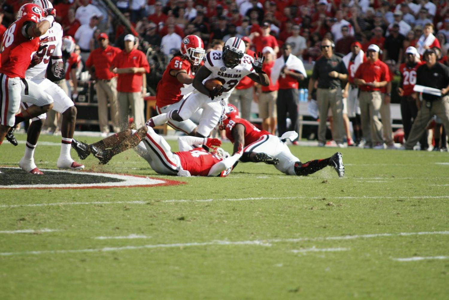 	South Carolina wide receiver Bruce Ellington is tackled near the 50-yard line.