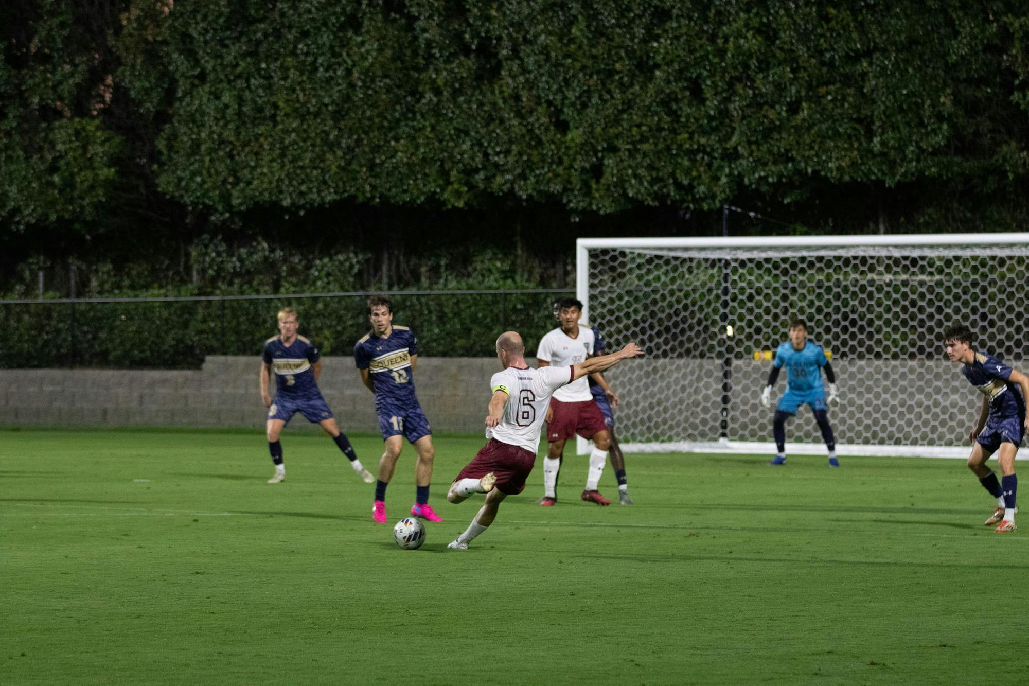 FILE — Junior midfielder Mika Habel rips a shot on goal in the men’s soccer game against Queens on Sept. 23, 2025. Habel dribbled a defender then cut in to rip a shot that soared over the goal.