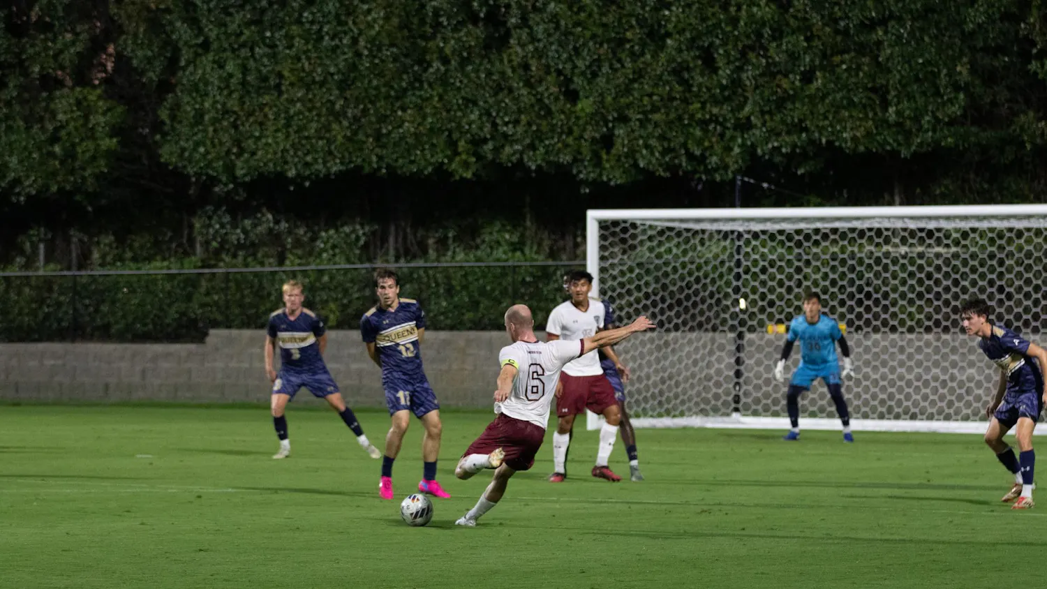 FILE — Junior midfielder Mika Habel rips a shot on goal in the men’s soccer game against Queens on Sept. 23, 2025. Habel dribbled a defender then cut in to rip a shot that soared over the goal.