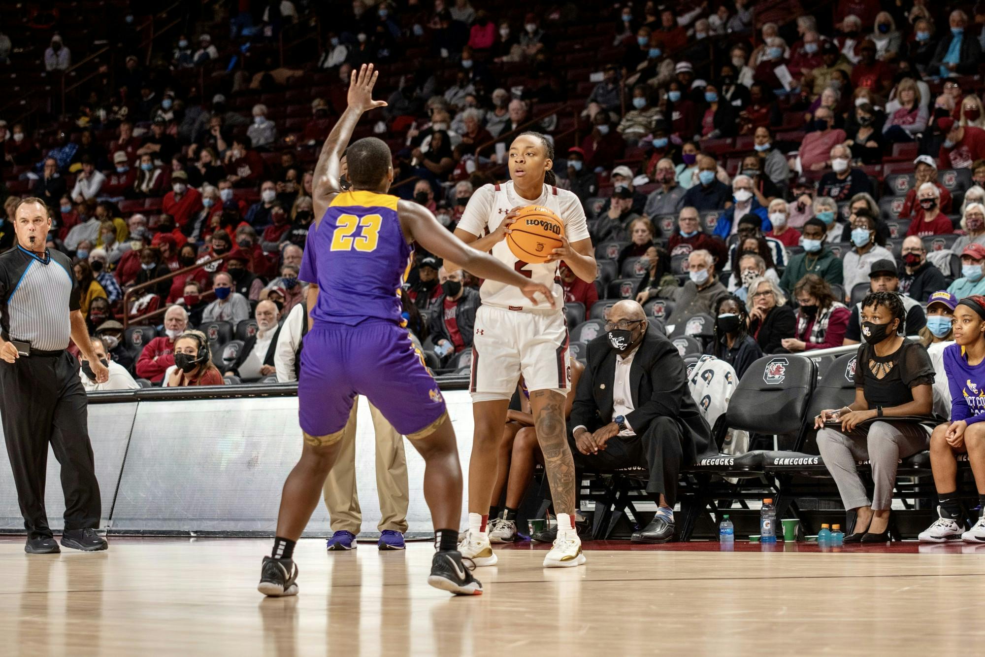 Sophomore guard Eniya Russell looks up to find a teammate who is open. &nbsp;