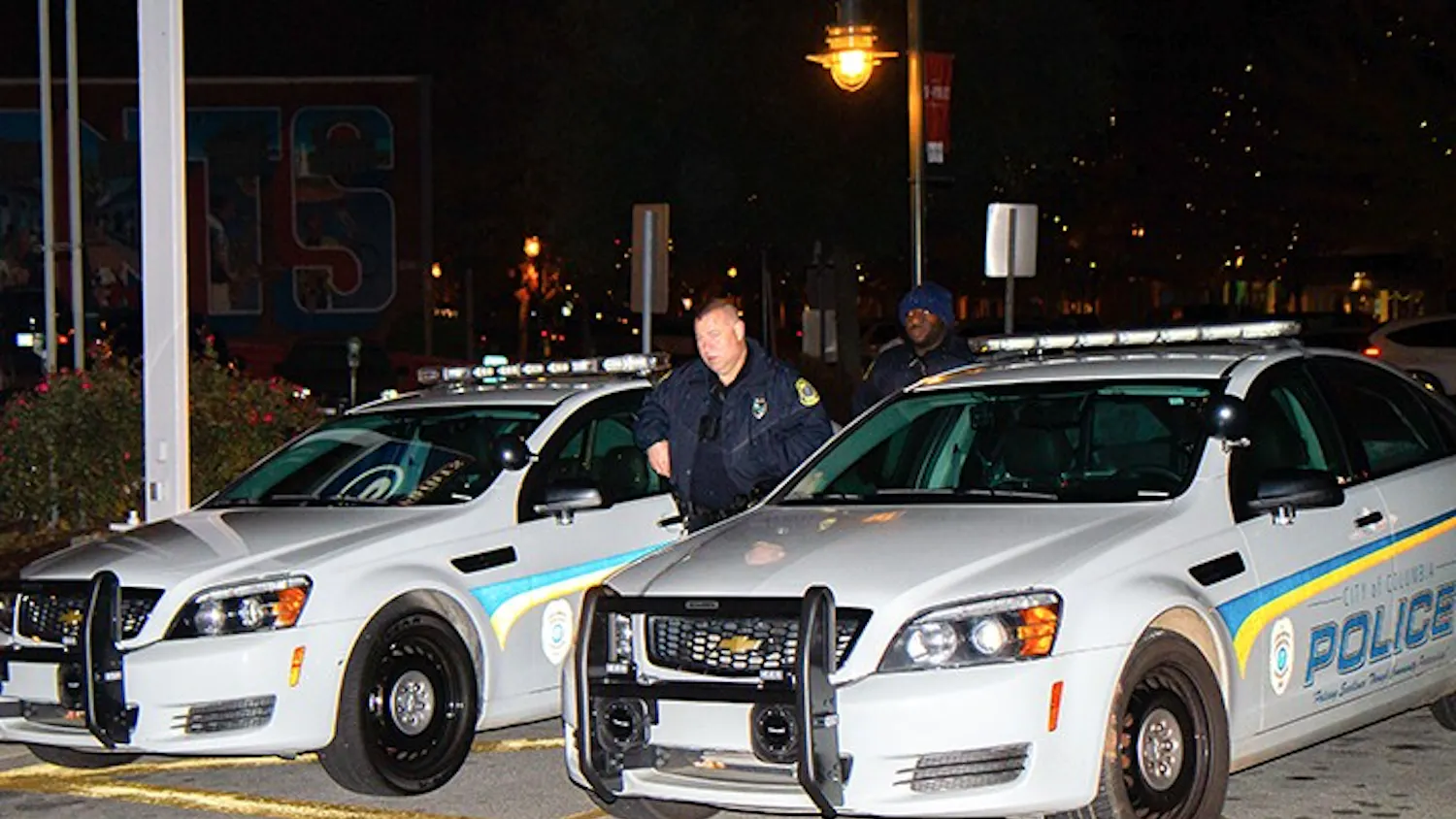 Columbia Police Department officers monitor the streets at night.