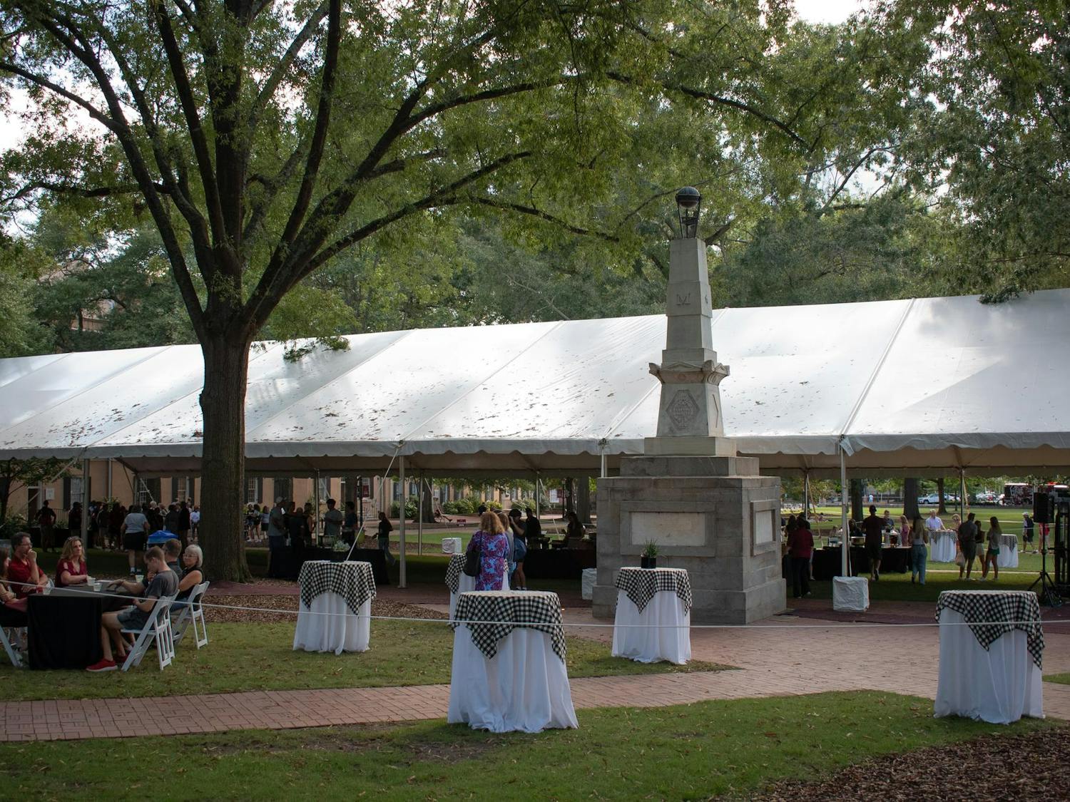 Students and their families gather around the Maxcy Monument on the Horseshoe on Sept. 20, 2024. Families visited campus throughout the day on Sept. 20 to participate in a variety of university and college events.
