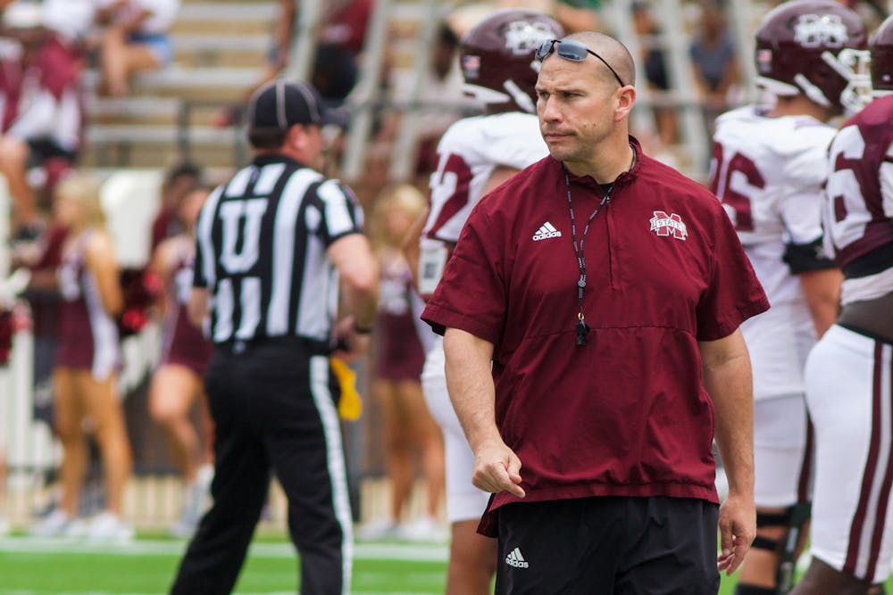 <p>Head coach Zach Arnett of Mississippi State studies his team during the break of play. Mississippi State is currently 2-1 for its 2023 football season.</p>