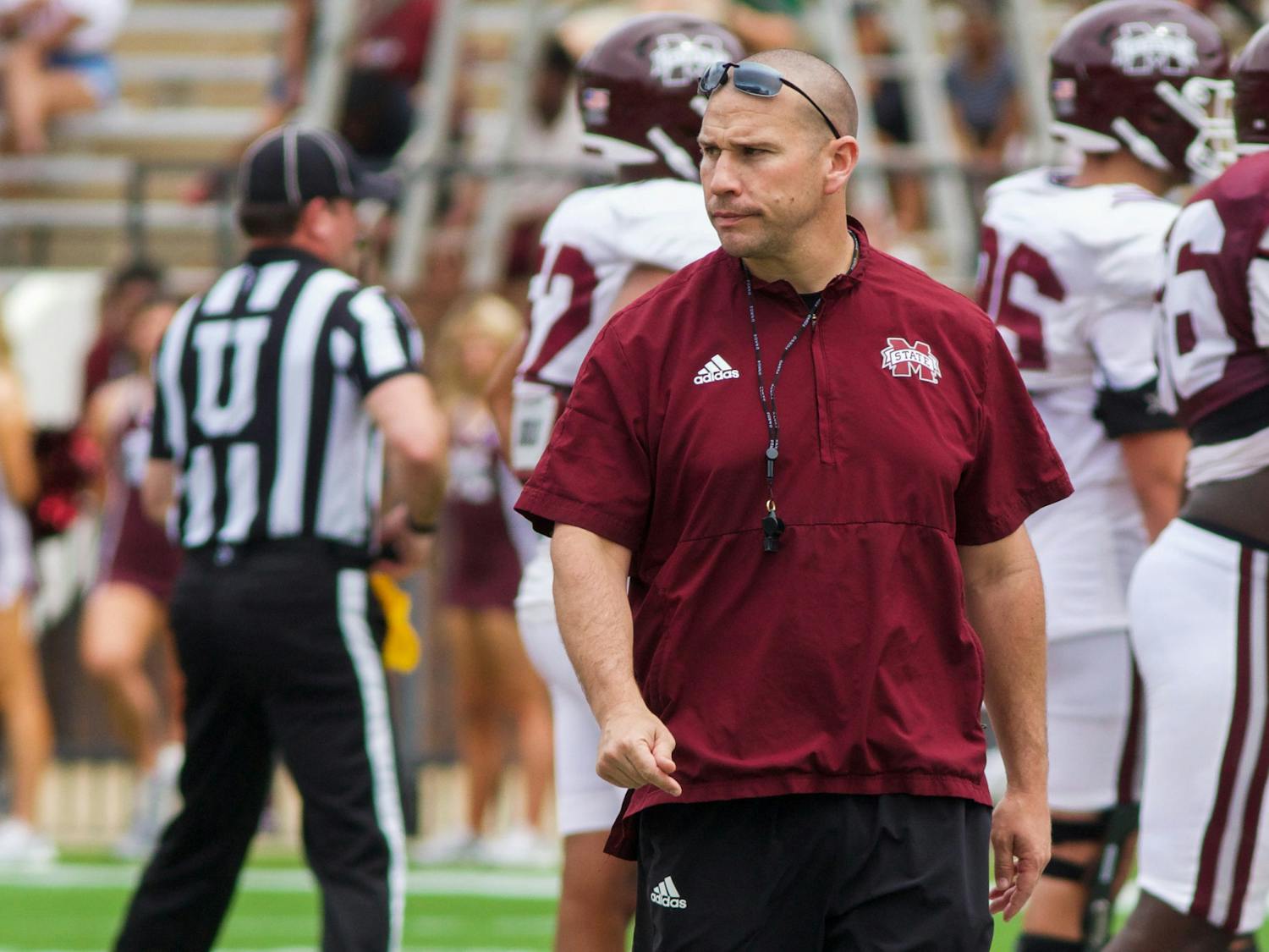 Head coach Zach Arnett of Mississippi State studies his team during the break of play. Mississippi State is currently 2-1 for its 2023 football season.