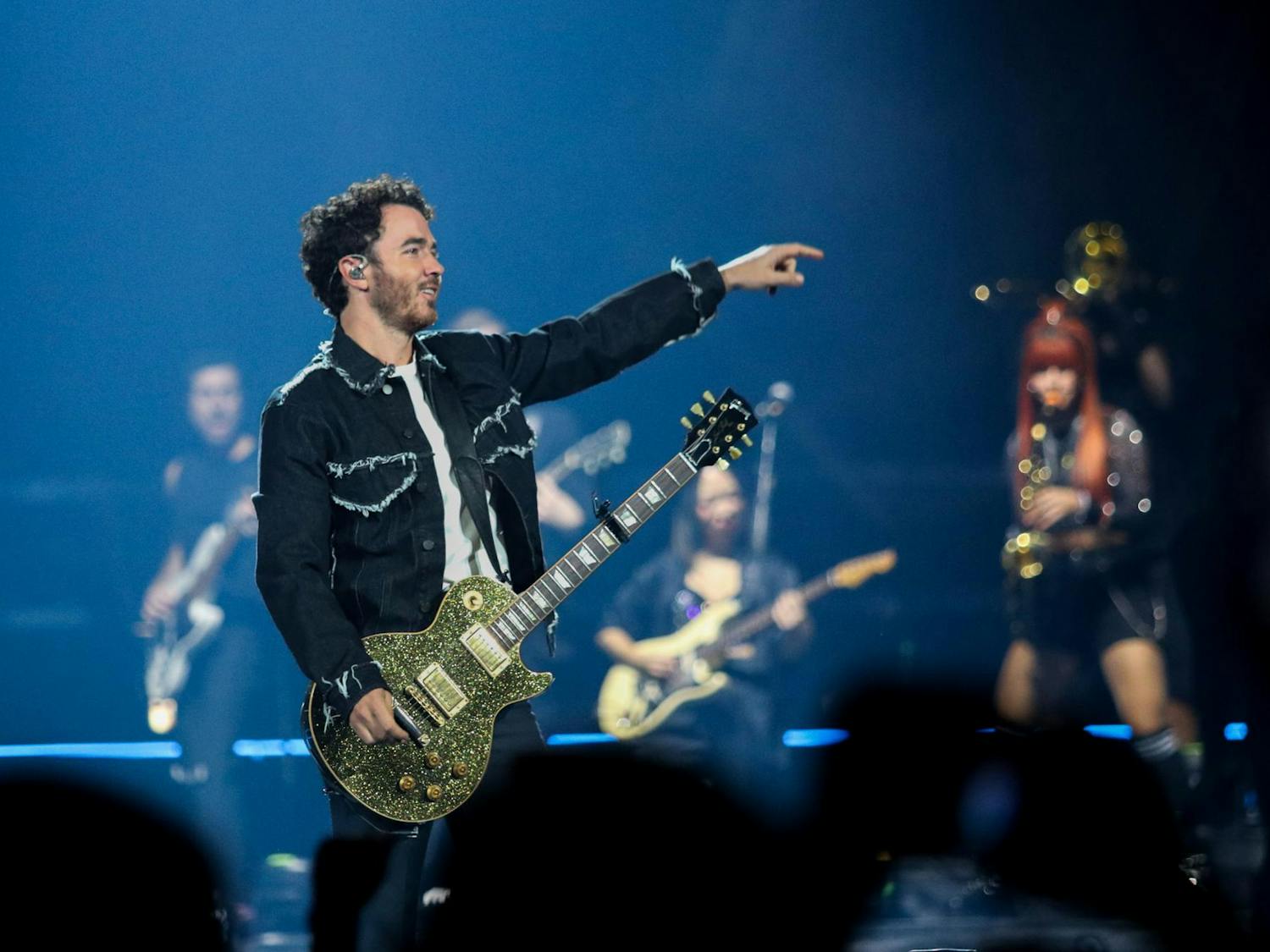 Kevin Jonas smiles at the audience at the start of The Tour at Colonial Life Arena. Kevin is the oldest member and lead guitar player for The Jonas Brothers.