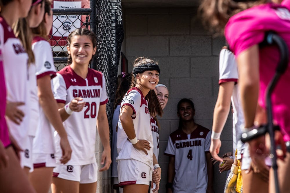 FILE— Fifth-year defender Jylissa Harris and the rest of the soccer team make their entrance before their game against Alabama on Oct. 24, 2021. South Carolina defeated Alabama 4-0.