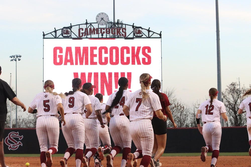 <p>Members of the Gamecock softball team run to the outfield after their win against Minnesota on March 16, 2024. The Gamecocks shut out the Gophers 4-0.</p>