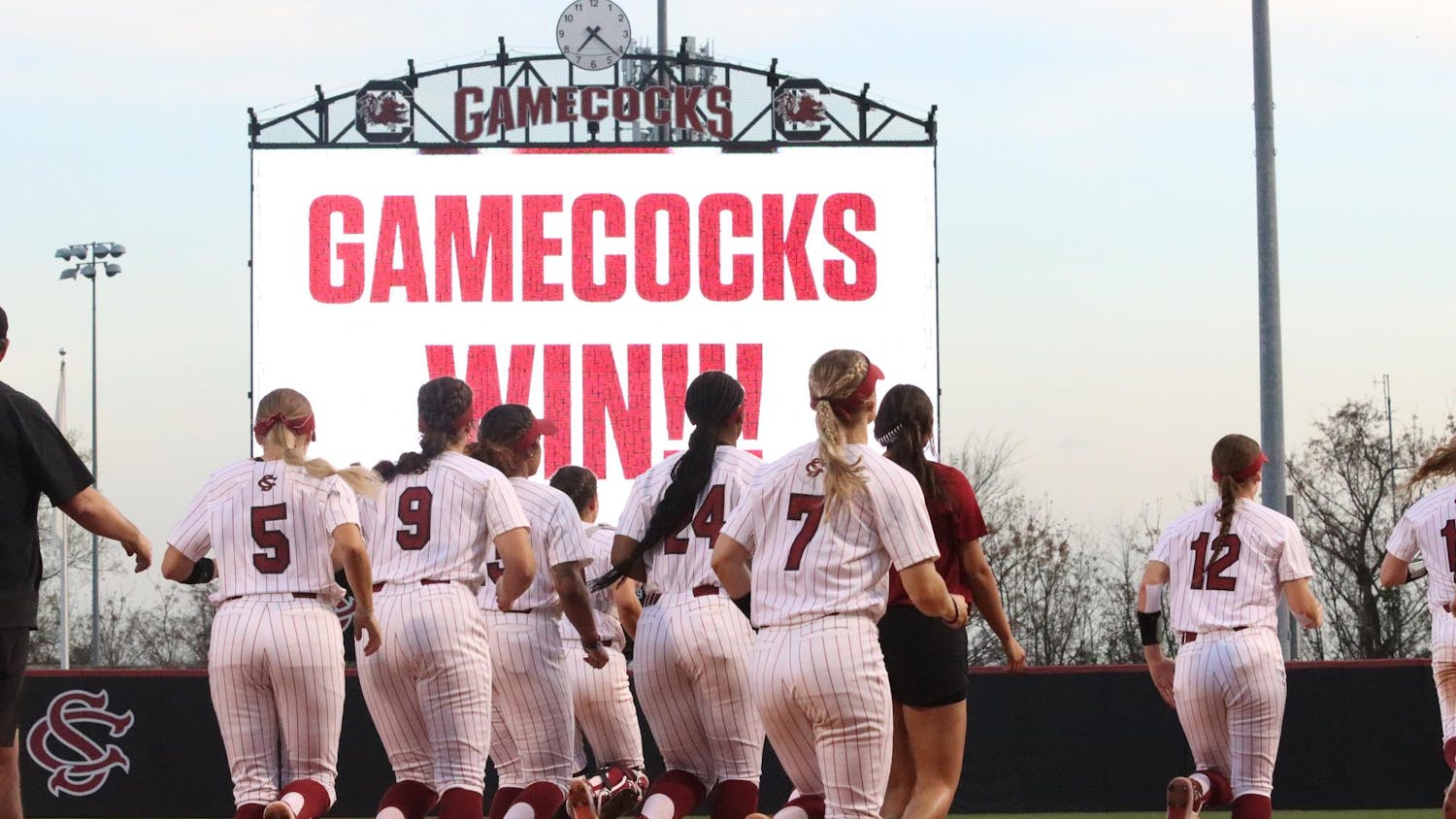 Members of the Gamecock softball team run to the outfield after their win against Minnesota on March 16, 2024. The Gamecocks shut out the Gophers 4-0.
