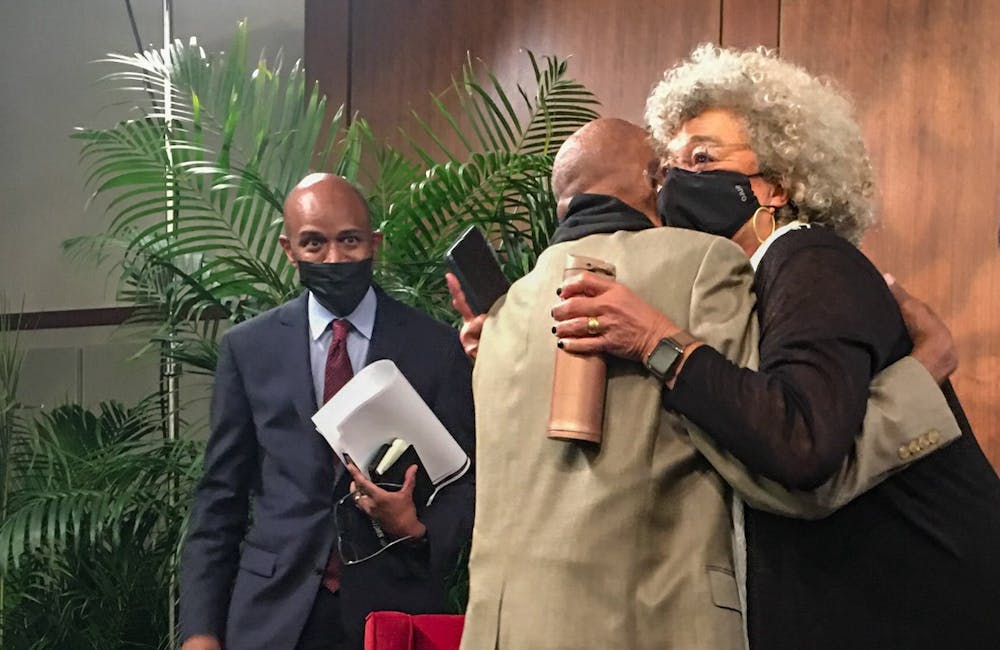 <p>Dr. Angela Davis hugs Andrew Billingsley following her lecture with Nikky Finney on April 21, 2022. This year's lecture marks the 50th year of the annual Robert Smalls Lecture first given by Billingsley.</p>