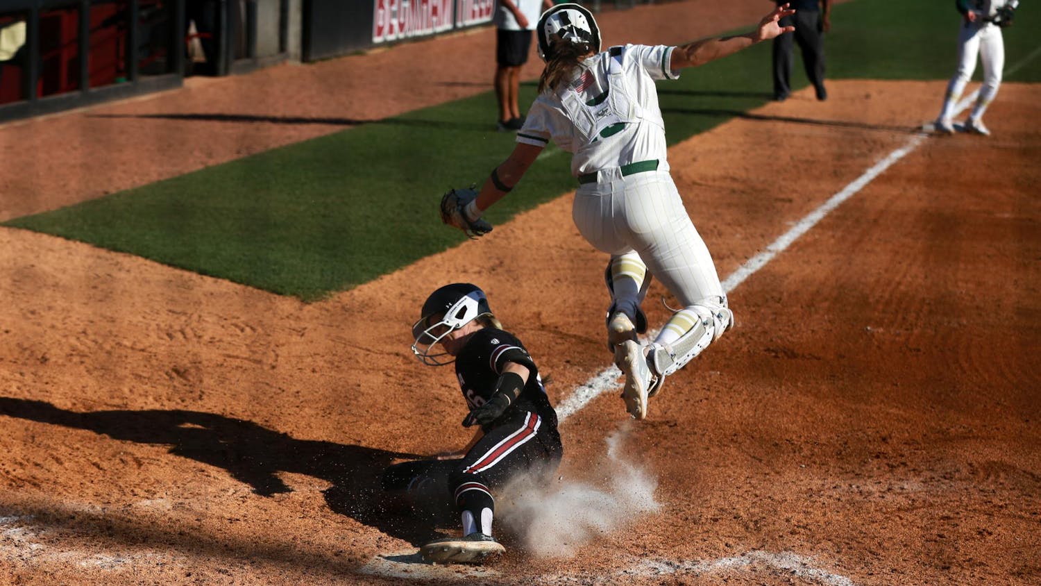 Senior infielder Riley Blampied slides onto home plate during South Carolina's matchup against UNC Charlotte at Beckham Field on Feb. 25, 2024. Blampied scored one run during the Gamecocks’ 7-2 win.
