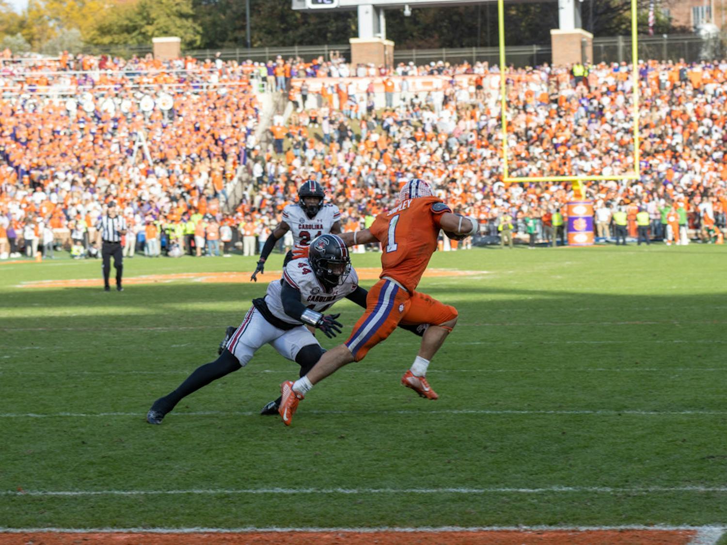 Sixth-year linebacker Sherrod Greene dives for a Clemson player on Nov. 26, 2022 at Memorial Stadium. Greene made the tackle against Clemson, bringing his total to 5 for the game.