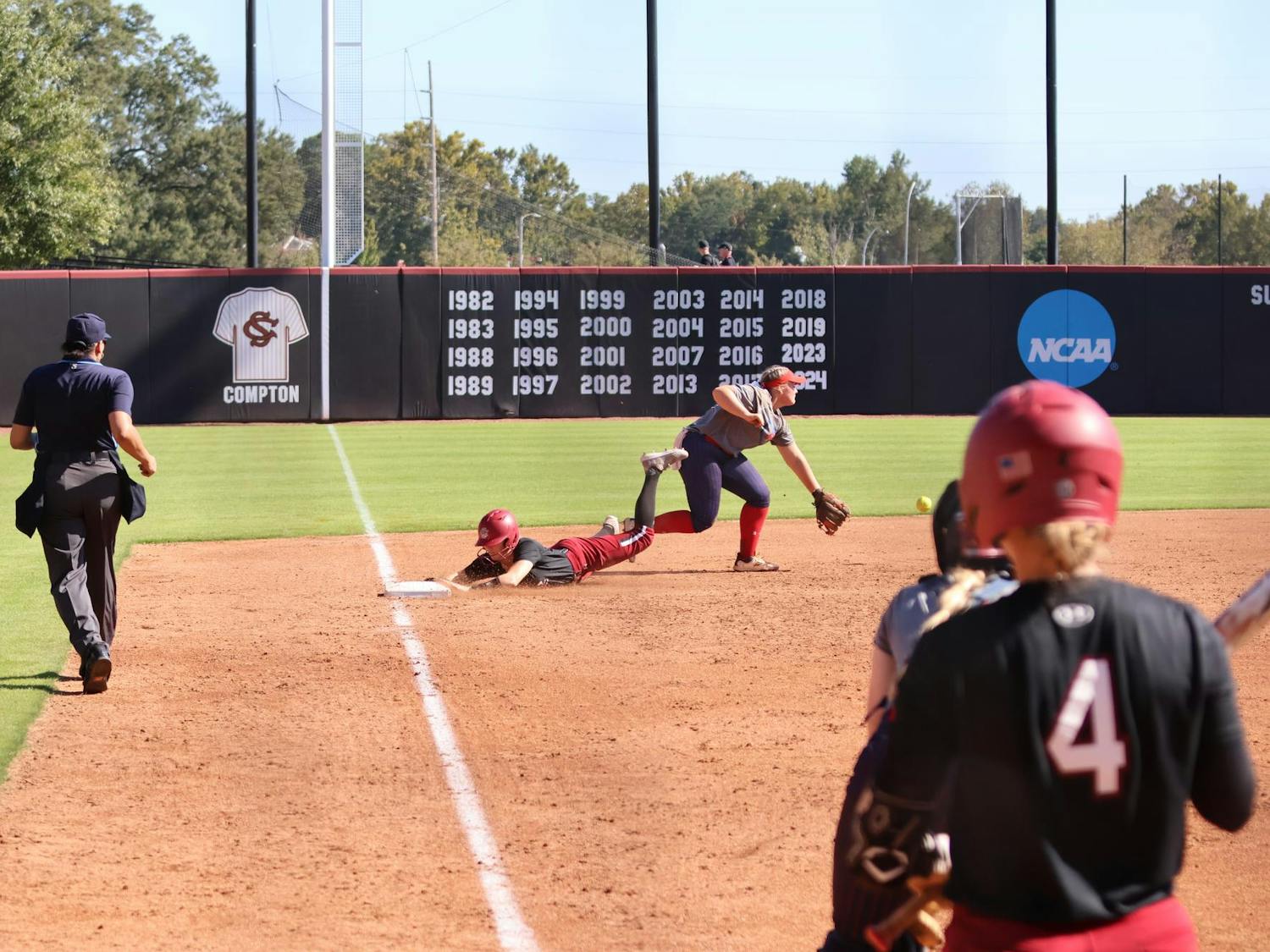 A South Carolina softball player slides onto third base during the Gamecocks' exhibition game against USC Aiken on Oct.12, 2024. South Carolina will face College of Charleston for its next exhibition game.