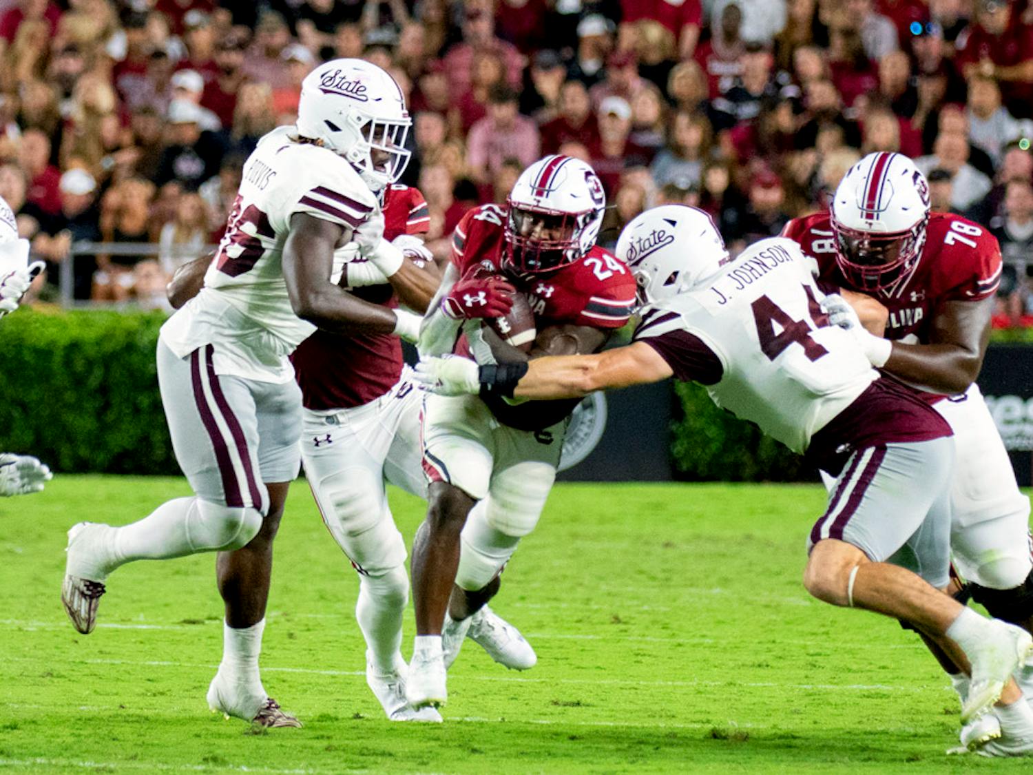 FILE — Redshirt senior running back Mario Anderson breaks through to cover his teammates during play during the University of South Carolina’s matchup against Mississippi State at Willimas-Brice Stadium on Sep. 23, 2023. Anderson rushed for 88 yards on 26 carries, both season highs.&nbsp;