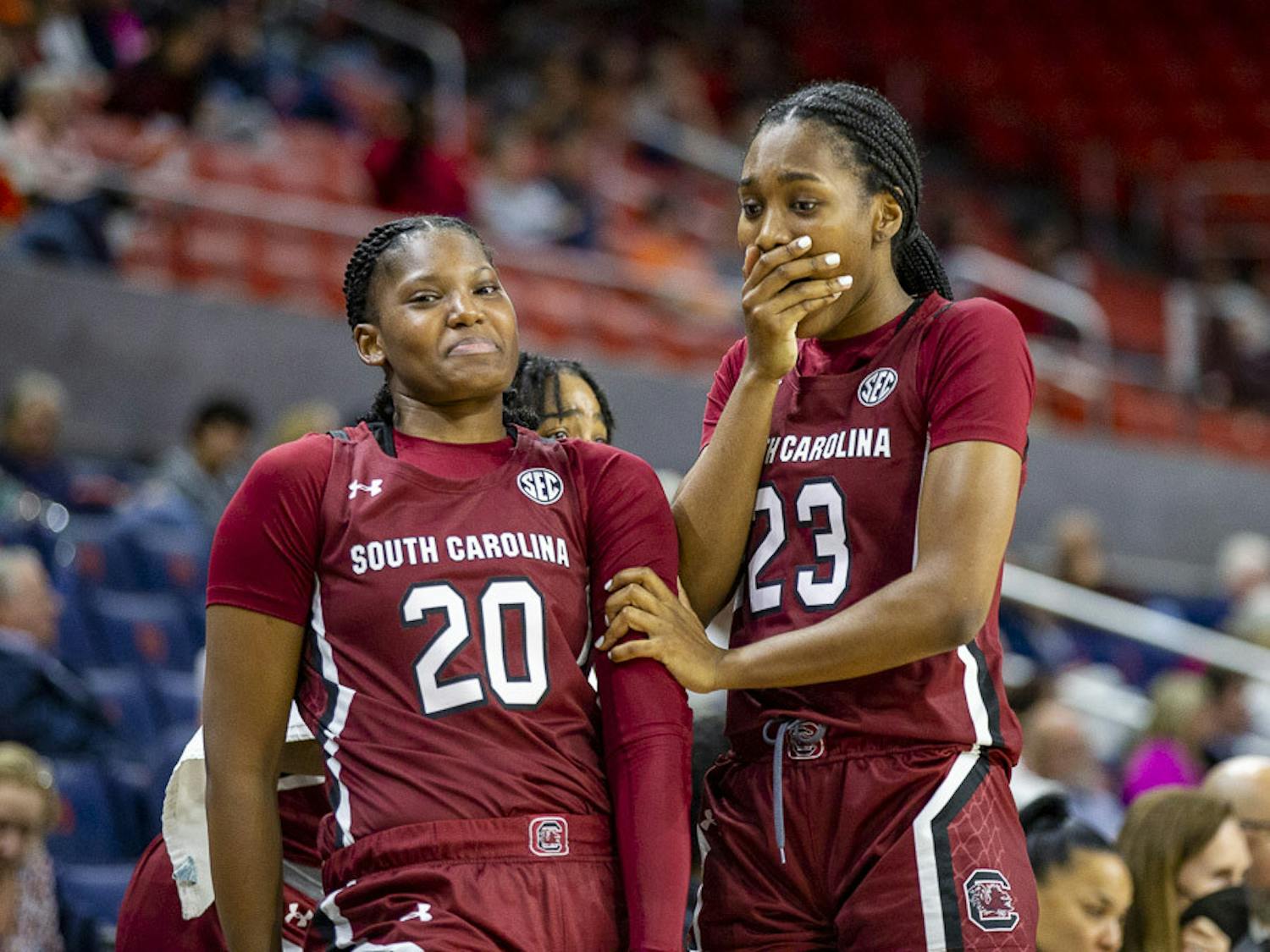 Sophomore forward Sania Feagin (on left) and sophomore guard Bree Hall (right) get excited after senior guard Zia Cooke scored a basket during the matchup against Auburn on Feb. 9, 2023. The Gamecocks finished the game with 52 points scored from inside the paint.&nbsp;