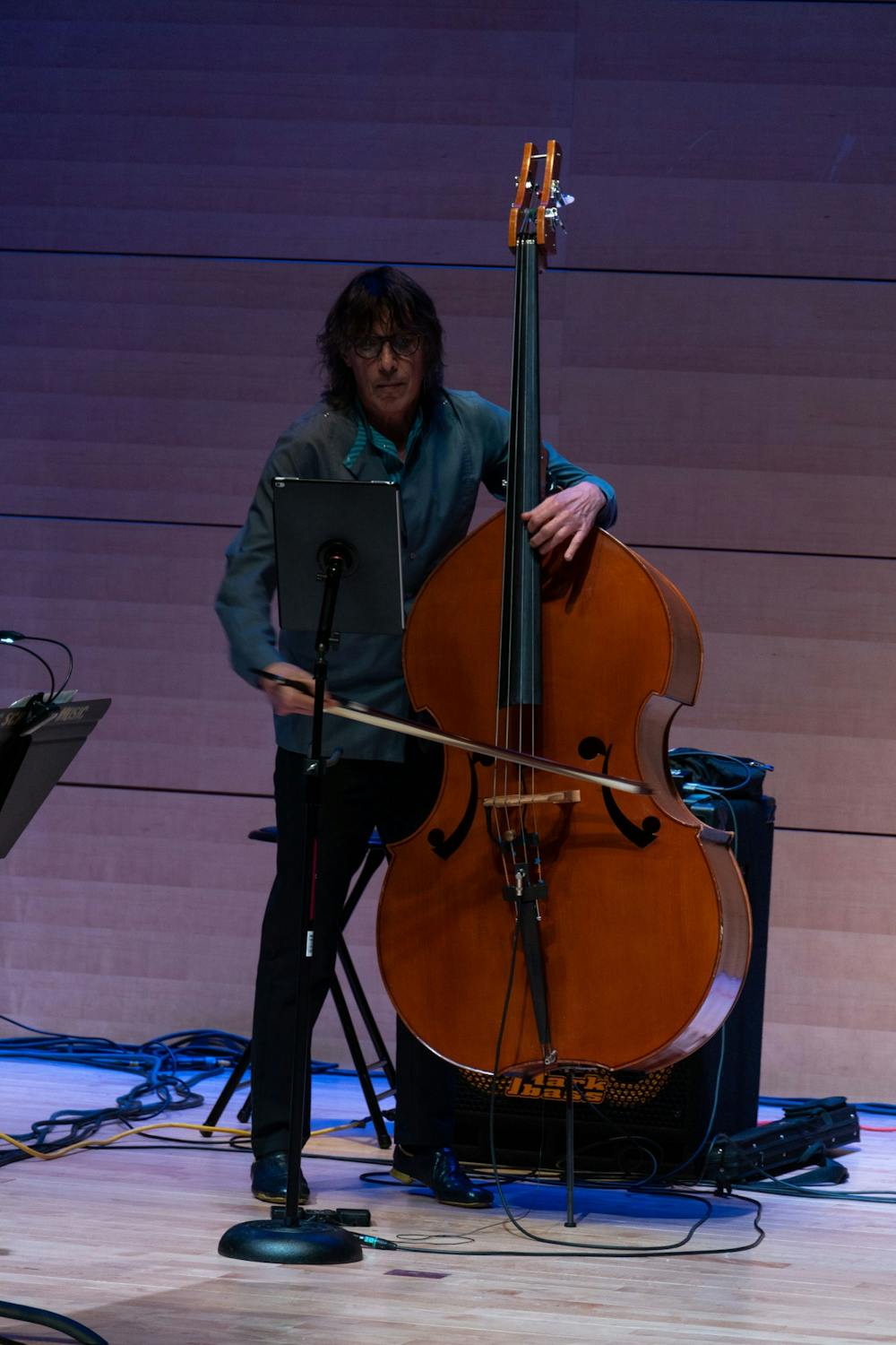 <p>Bassist Robert Black plays an aggressive solo during one of the band's compositions.&nbsp;</p>