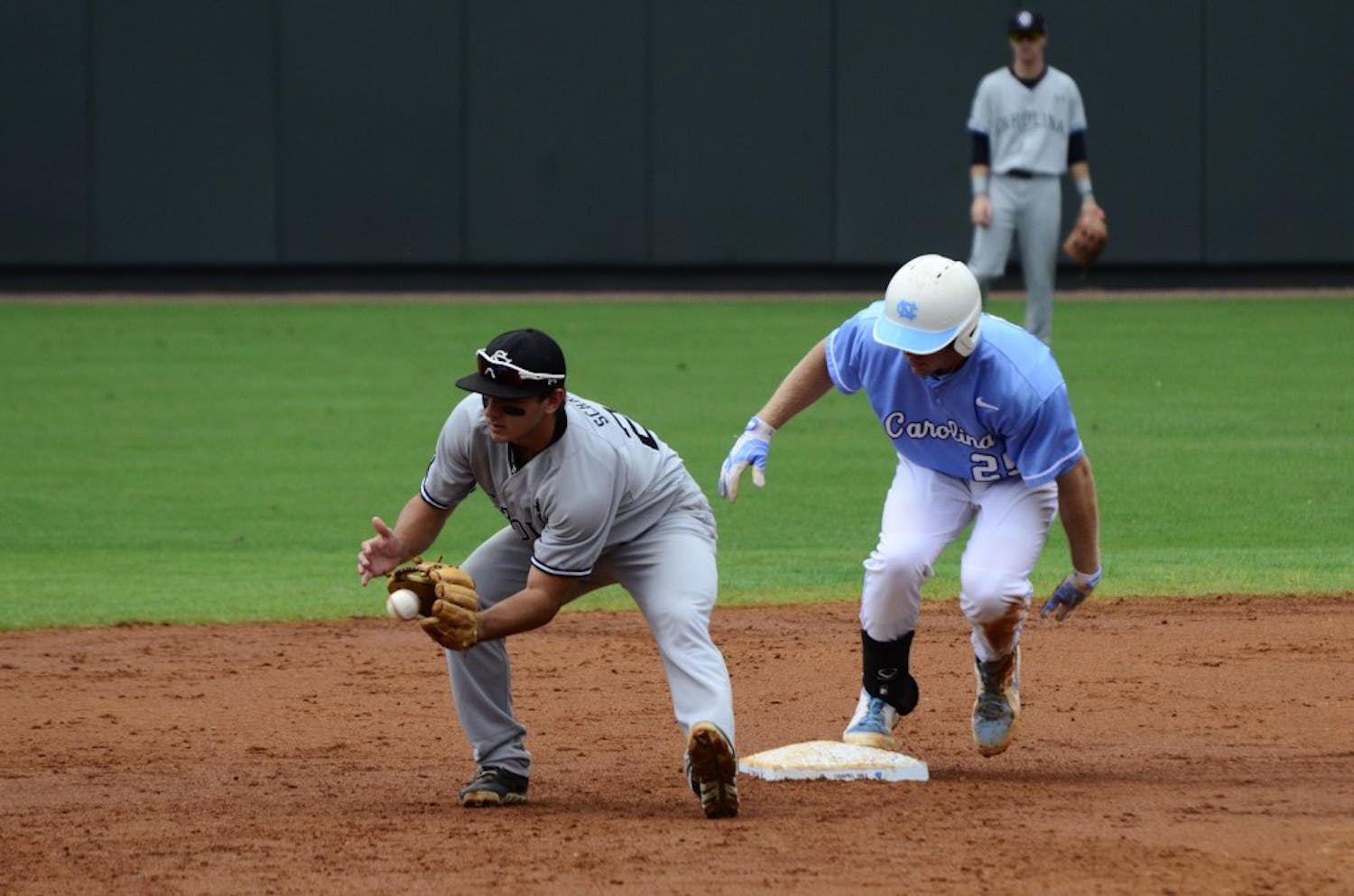 Max Schrock attempts to tag out a UNC player on second.