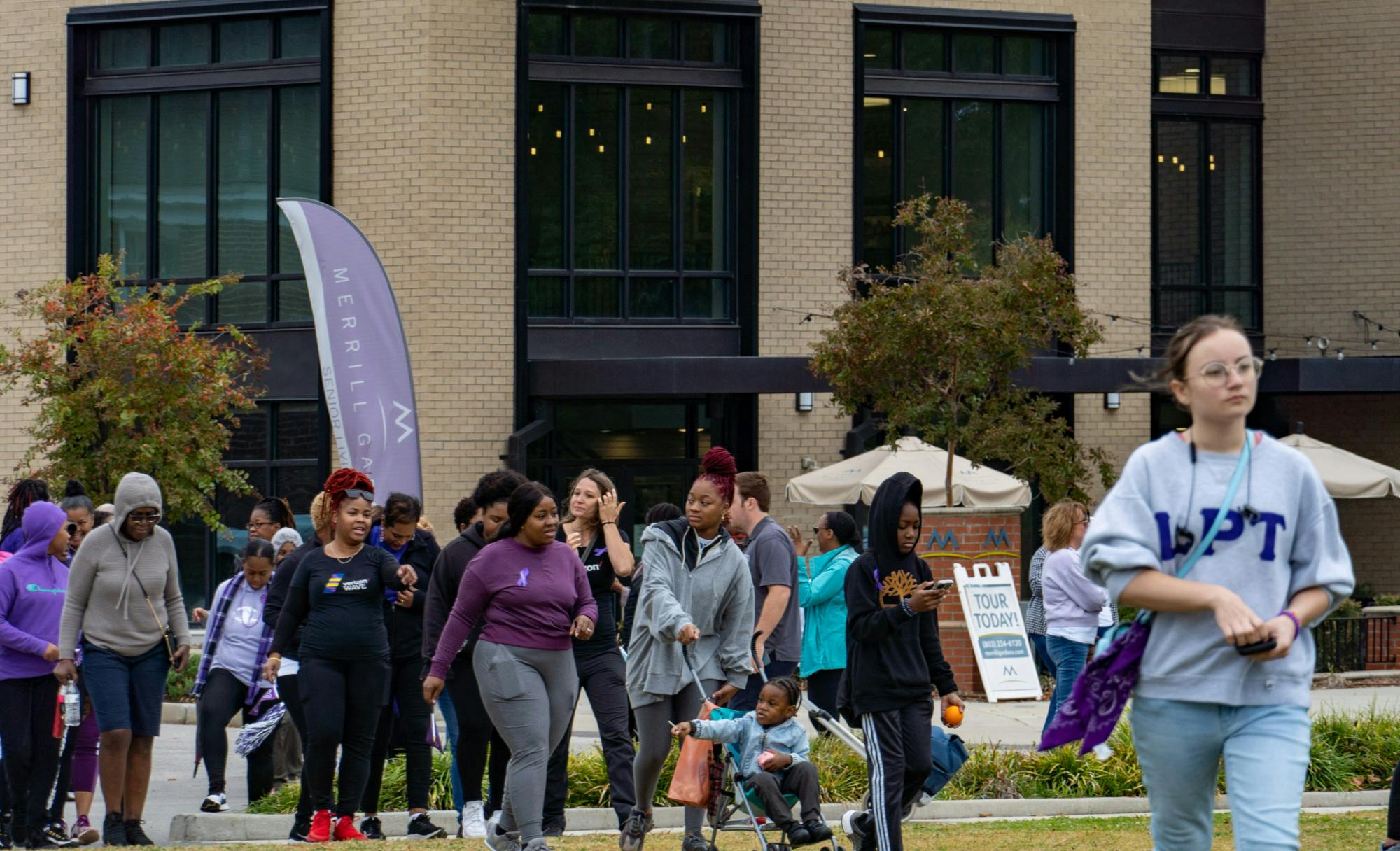 South Carolina students and community members walk into Page Ellington Park to complete the 2022 Mayor's Walk Against Domestic Violence. Community members and organizations gathered for the walk to fight against domestic violence.