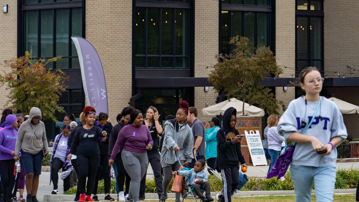 South Carolina students and community members walk into Page Ellington Park to complete the 2022 Mayor's Walk Against Domestic Violence. Community members and organizations gathered for the walk to fight against domestic violence.