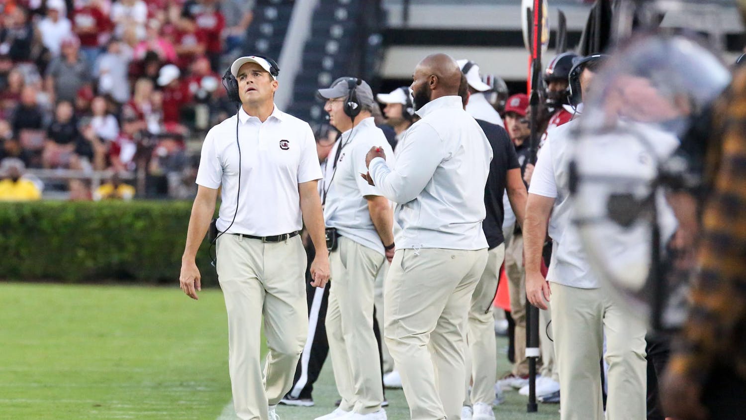 Head coach Shane Beamer looks toward the scoreboard as he walks the sideline during South Carolina's game against Flordia on Oct. 14, 2023, at Williams-Brice Stadium. The Gamecocks lost to the Gators 41-39.