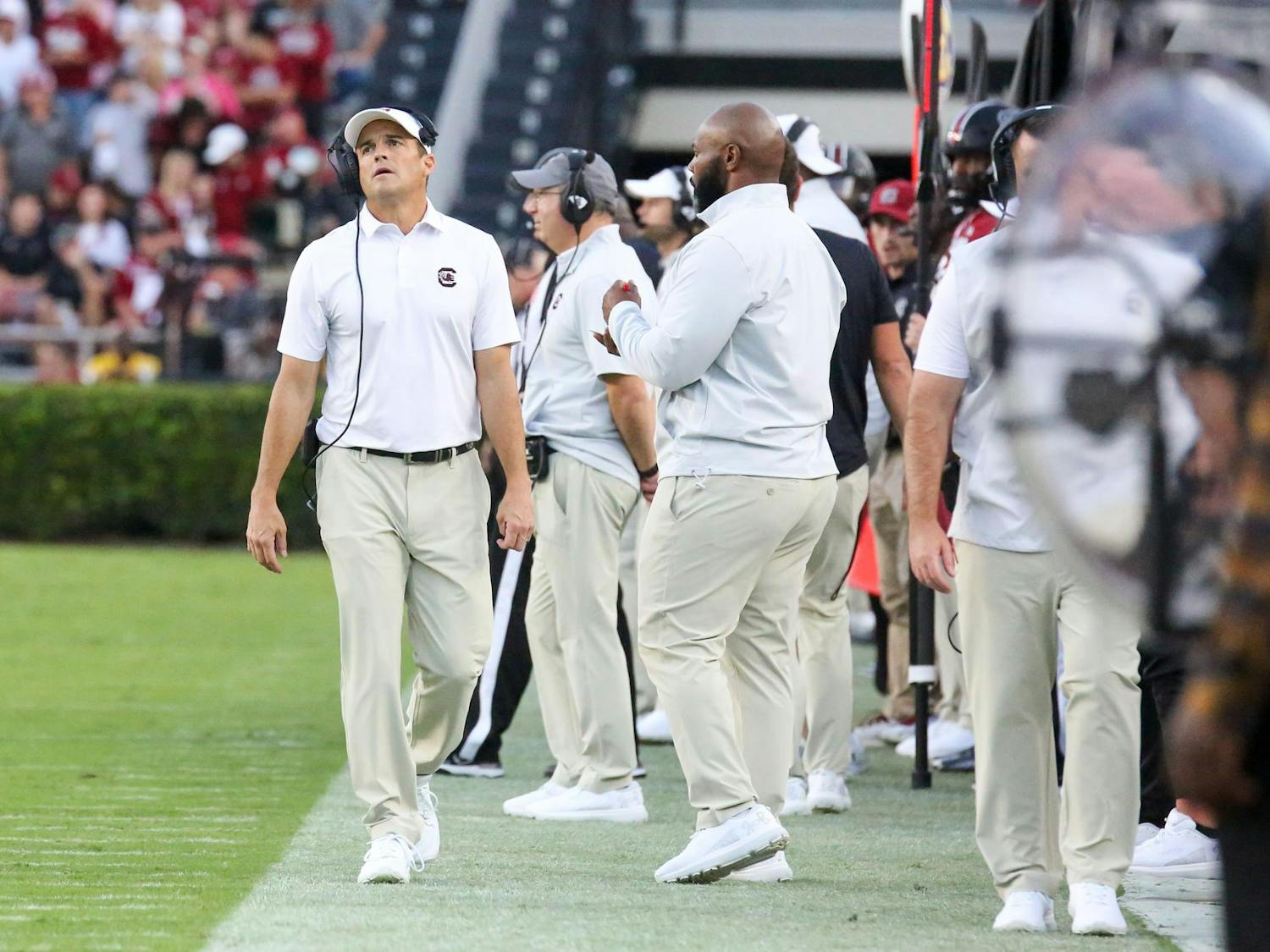 Head coach Shane Beamer looks toward the scoreboard as he walks the sideline during South Carolina's game against Flordia on Oct. 14, 2023, at Williams-Brice Stadium. The Gamecocks lost to the Gators 41-39.